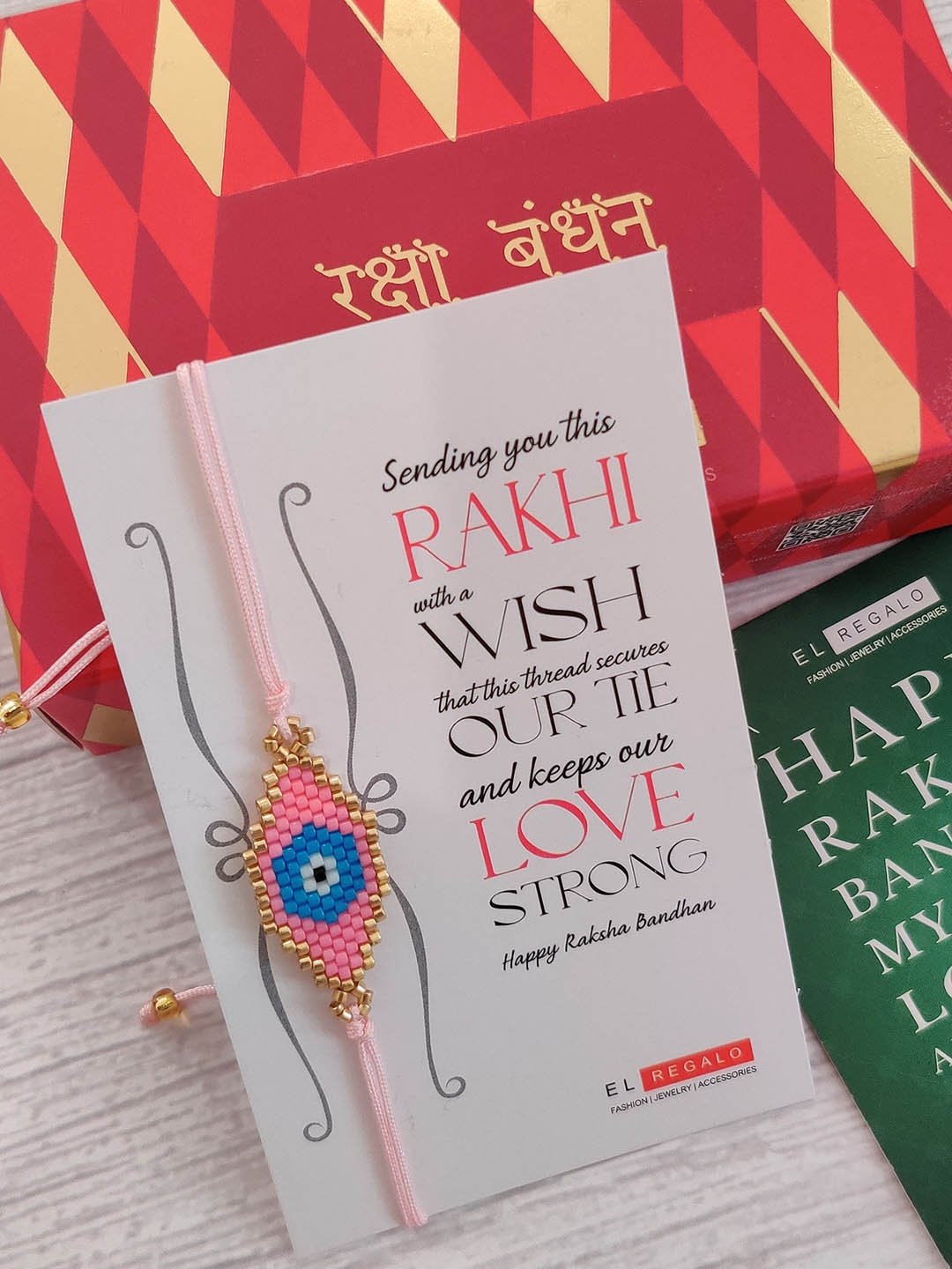 

EL REGALO Pink & Blue Embellished Miyuki Seed Wraparound Rakhi & Greeting Card Set