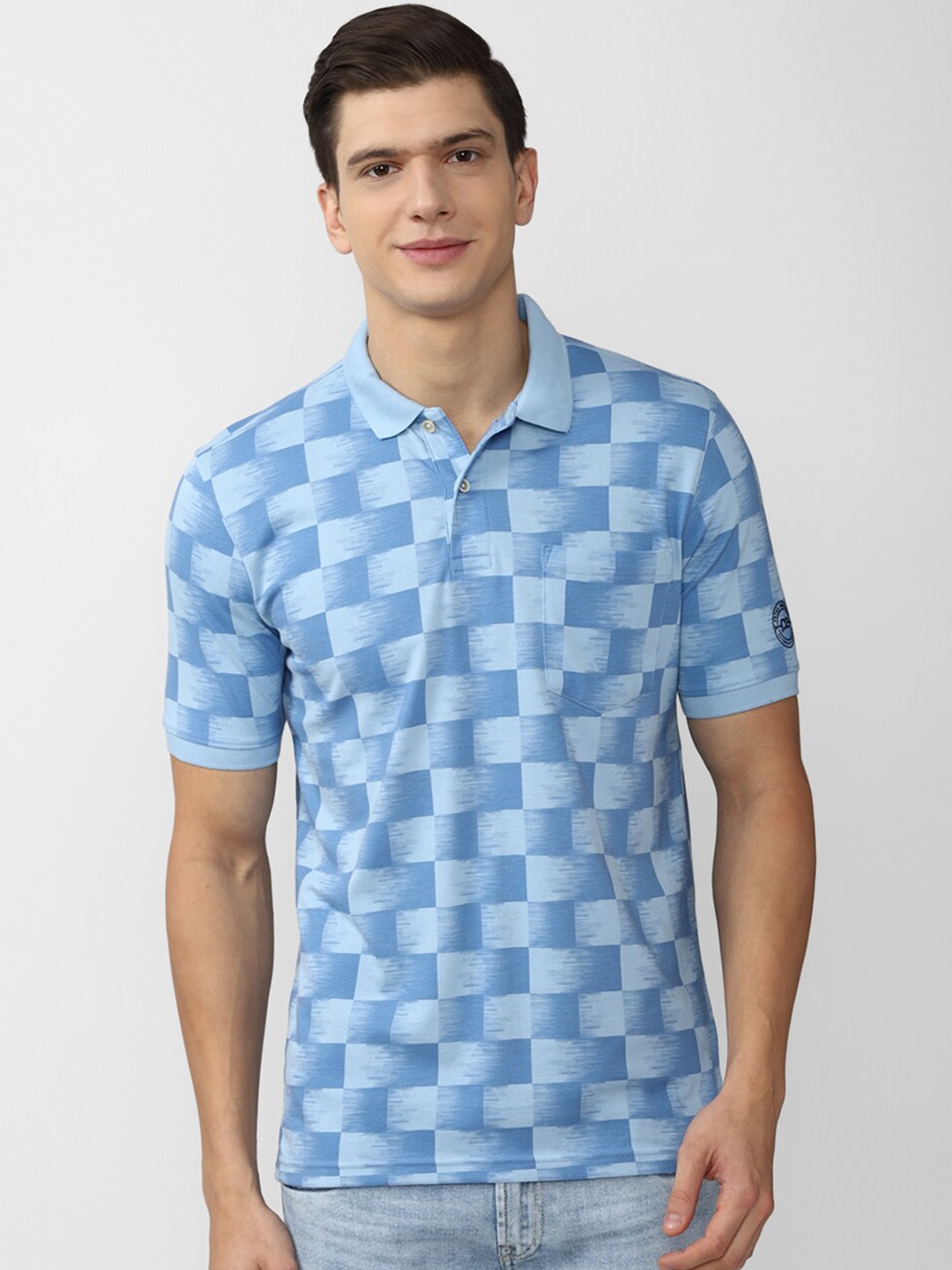

Peter England Casuals Men Blue & tannin Checked Polo Collar Applique T-shirt