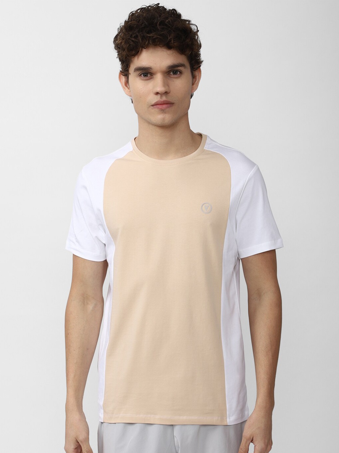 

Van Heusen Flex Men Peach-Coloured Colourblocked Raw Edge Slim Fit Sports T-shirt