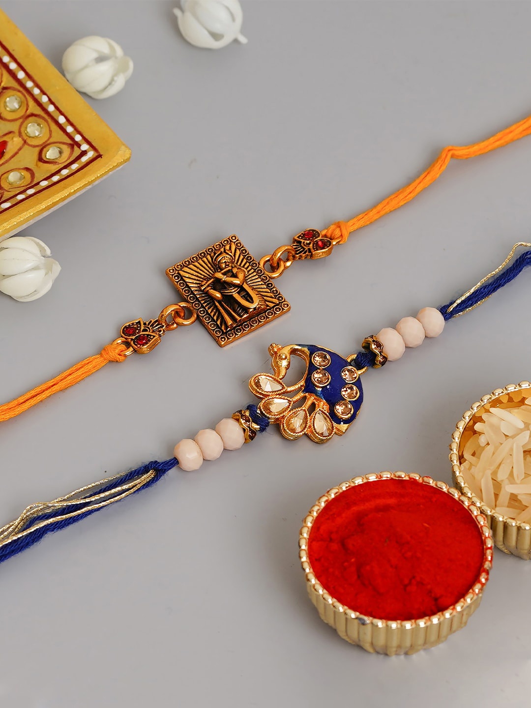 

eCraftIndia Set Of 2 Multicoloured Studded Rakhis, Multi