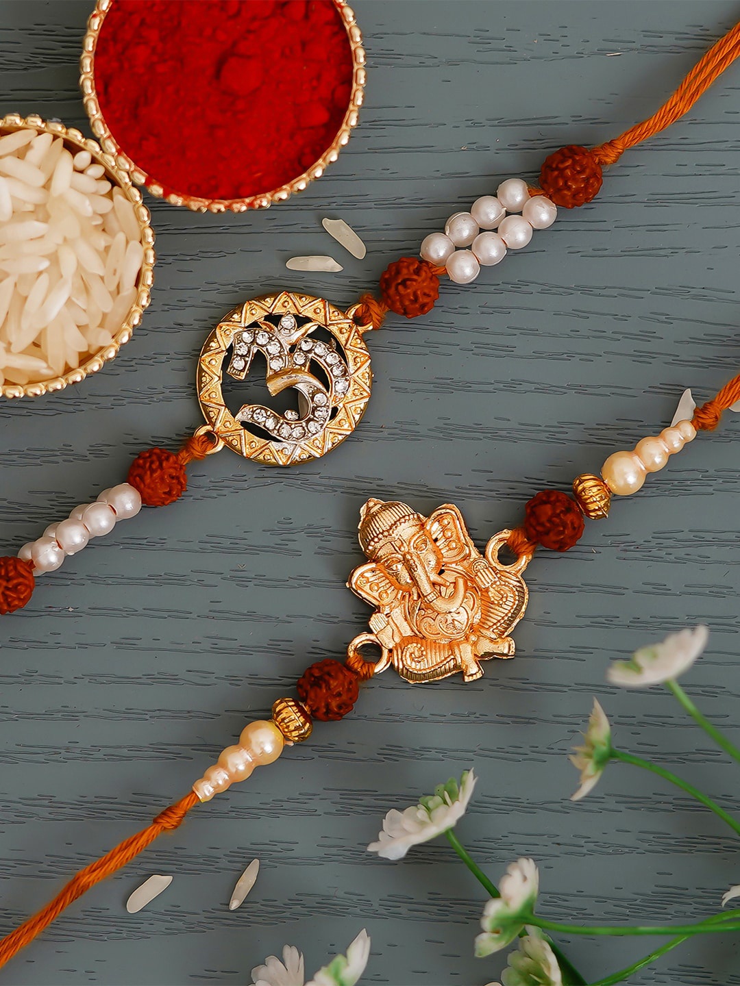 

eCraftIndia Set of 2 Om & Ganpati Religious Rudraksh Rakhi with Roli Chawal, Multi