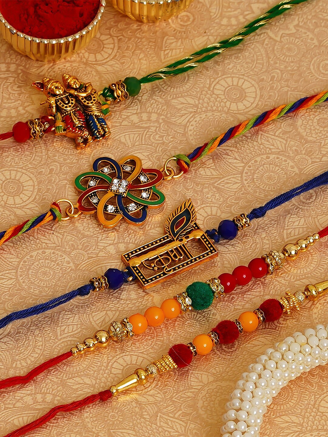 

eCraftIndia Set Of 5 Multicoloured Studded Rakhis, Multi