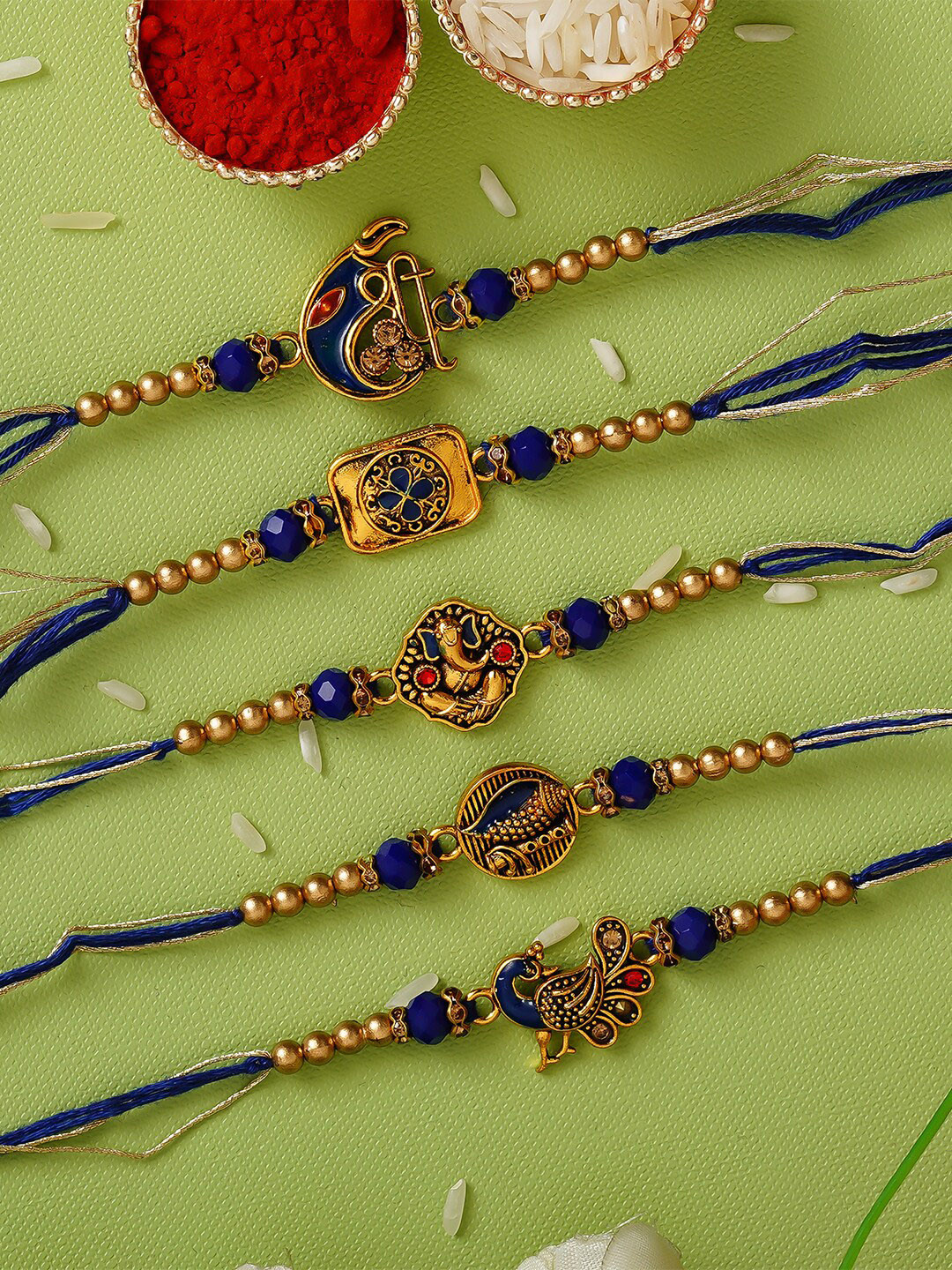 

eCraftIndia Pack Of 5 Blue & Golden Religious Rakhis & Roli Chawal