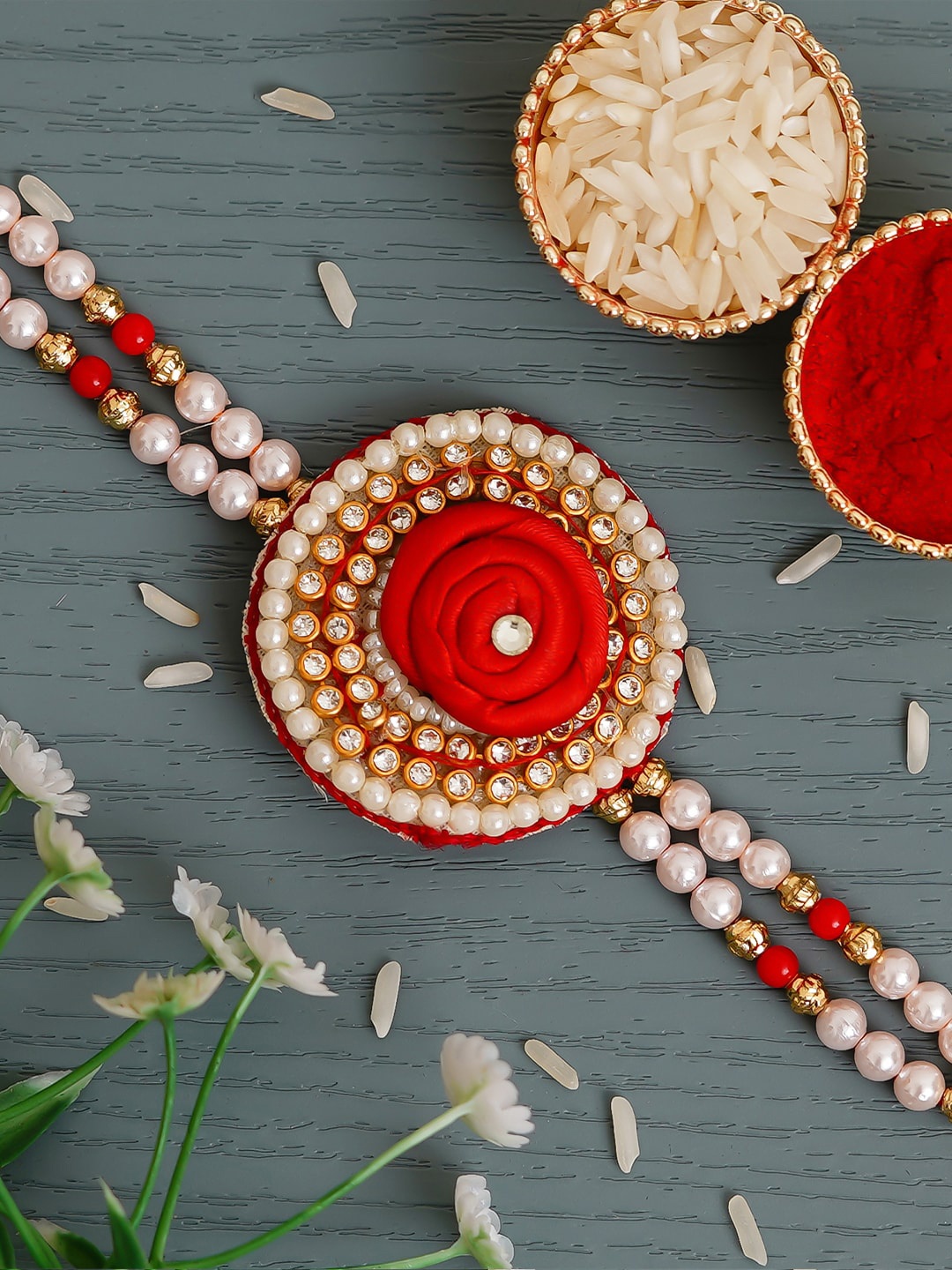 

eCraftIndia Red Floral Pearl Rakhi & Roli Chawal Pack