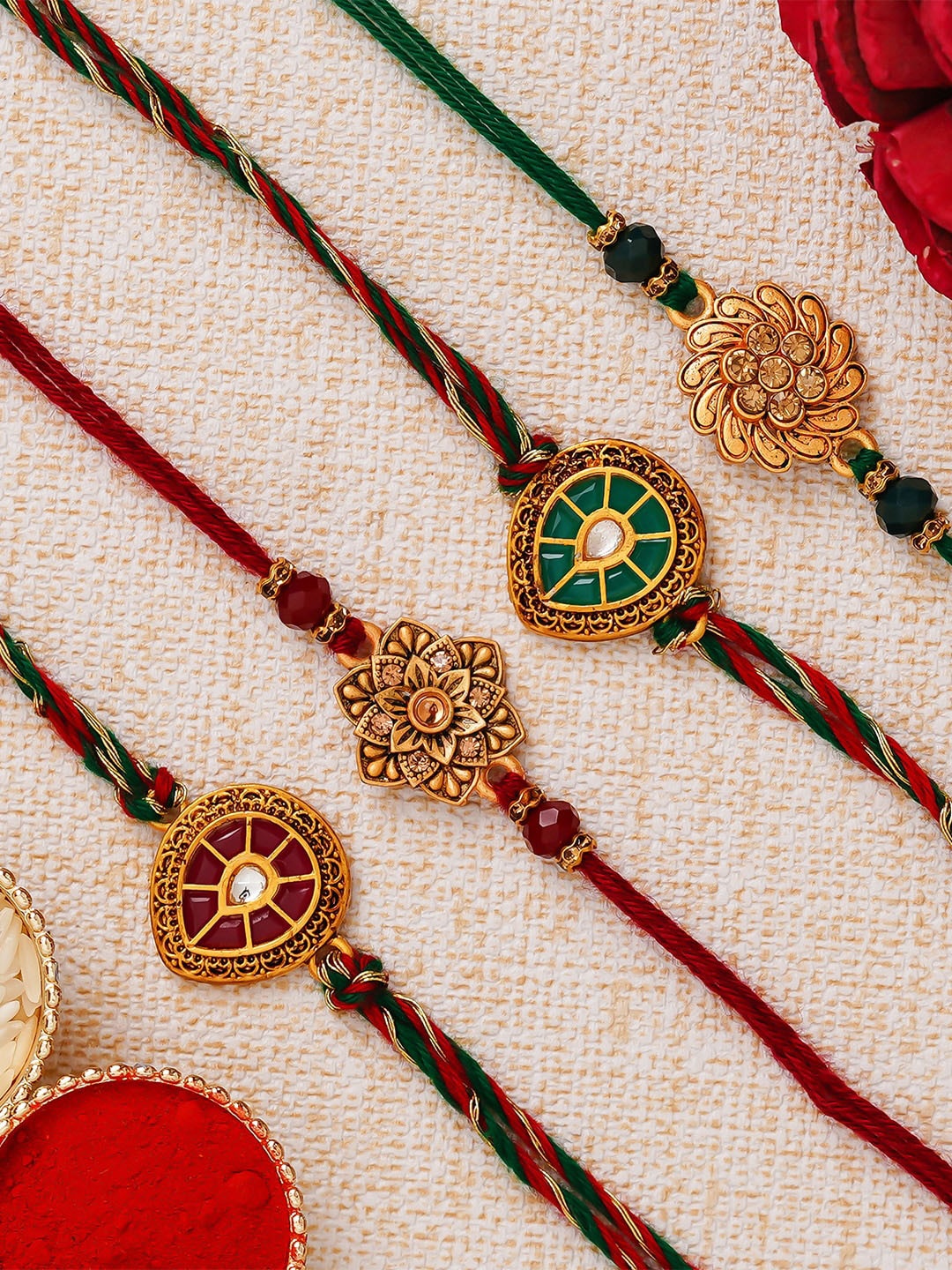 

eCraftIndia Set Of 4 Red & Gold-Toned Studded Rakhis