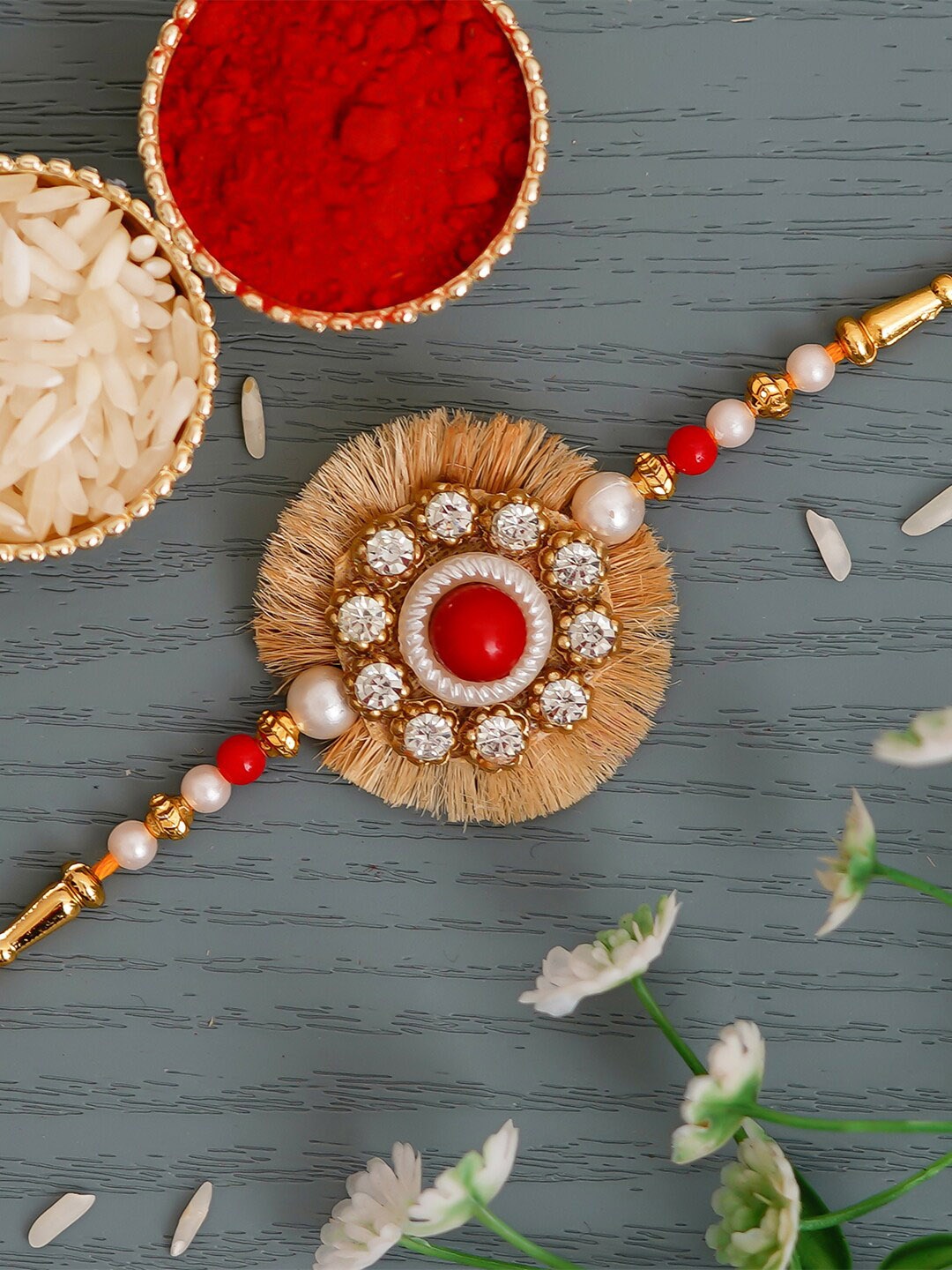 

eCraftIndia Red & Gold-Toned Floral Rakhi and Roli Chawal Pack