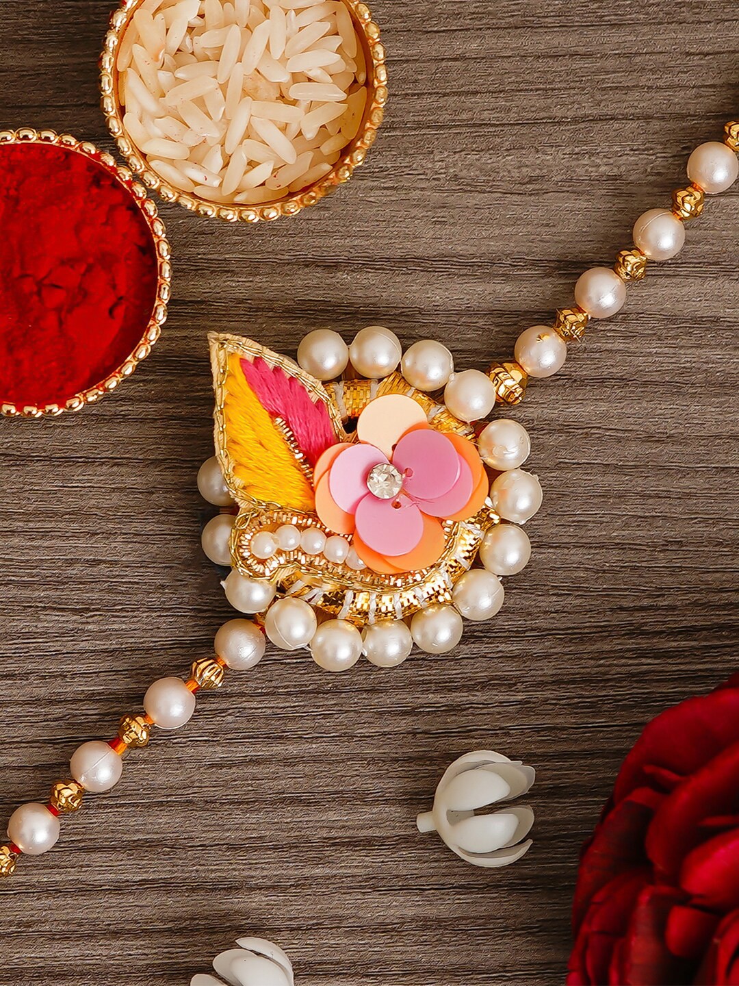 

eCraftIndia Multi-Coloured Floral Rakhi & Roli Chawal