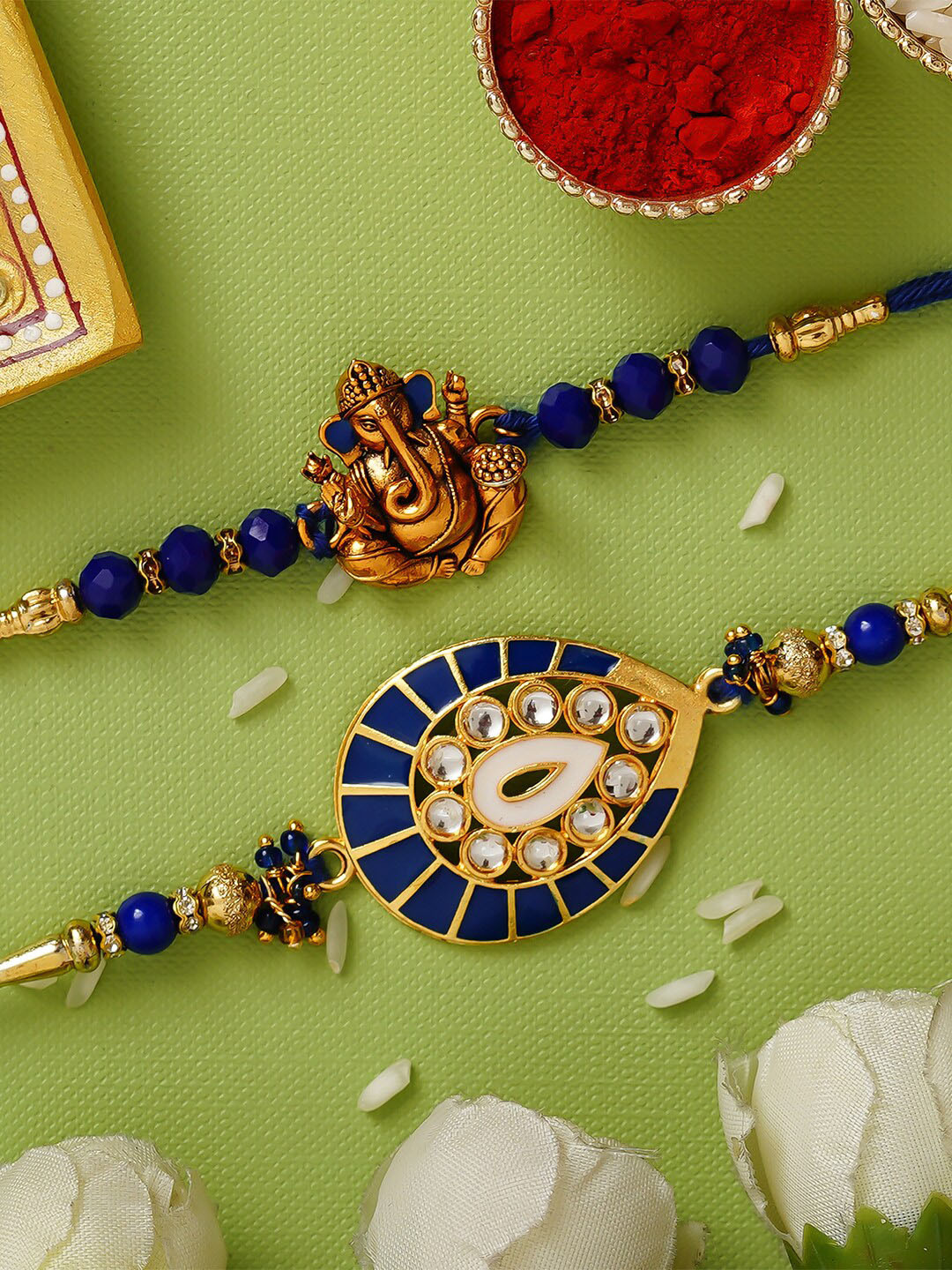 

eCraftIndia Blue & Gold-Toned Pack of 2 Designer Rakhis and Roli Chawal Pack