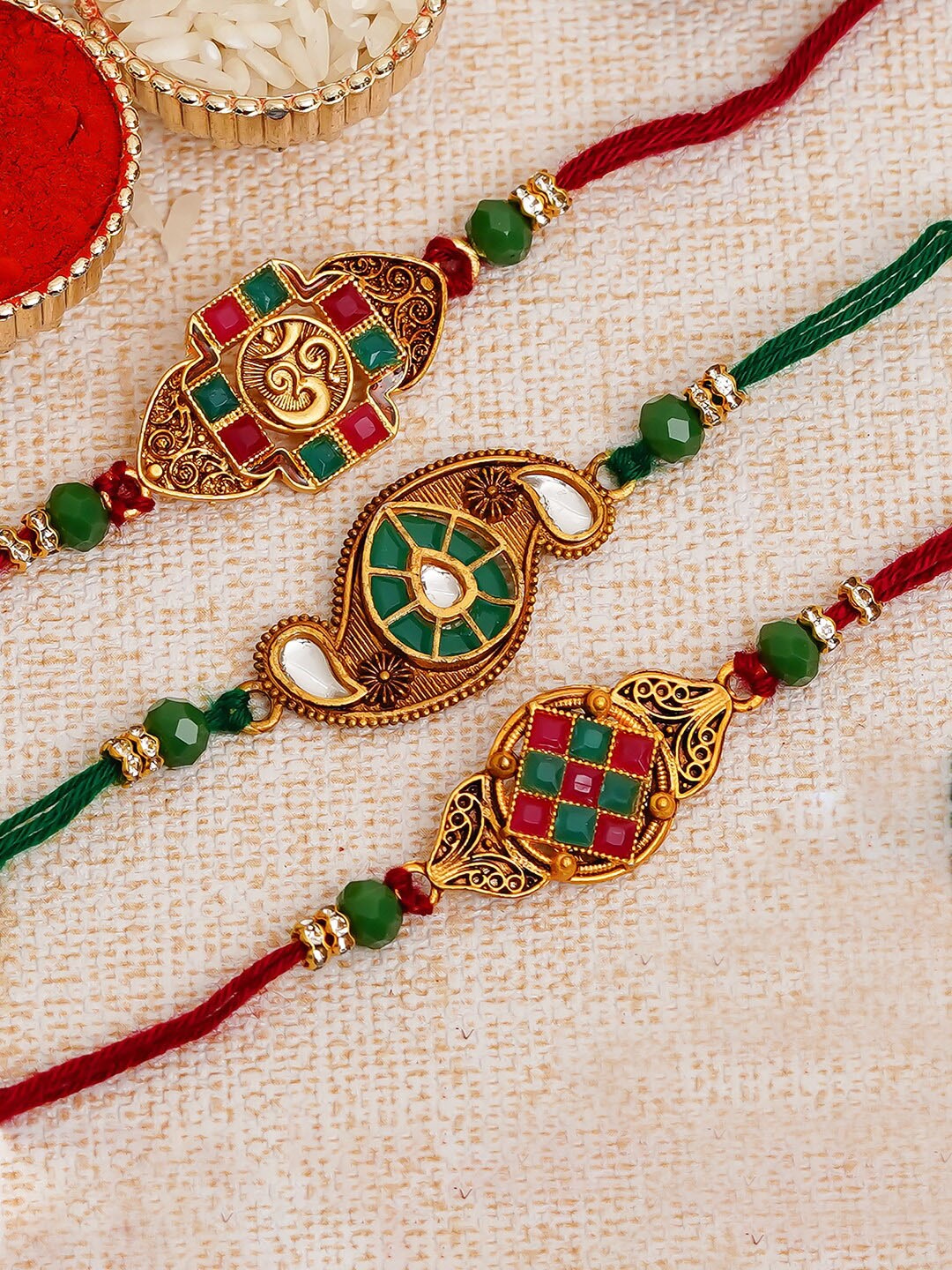 

eCraftIndia Set Of 3 Red & Gold-Toned Religious Studded Rakhis