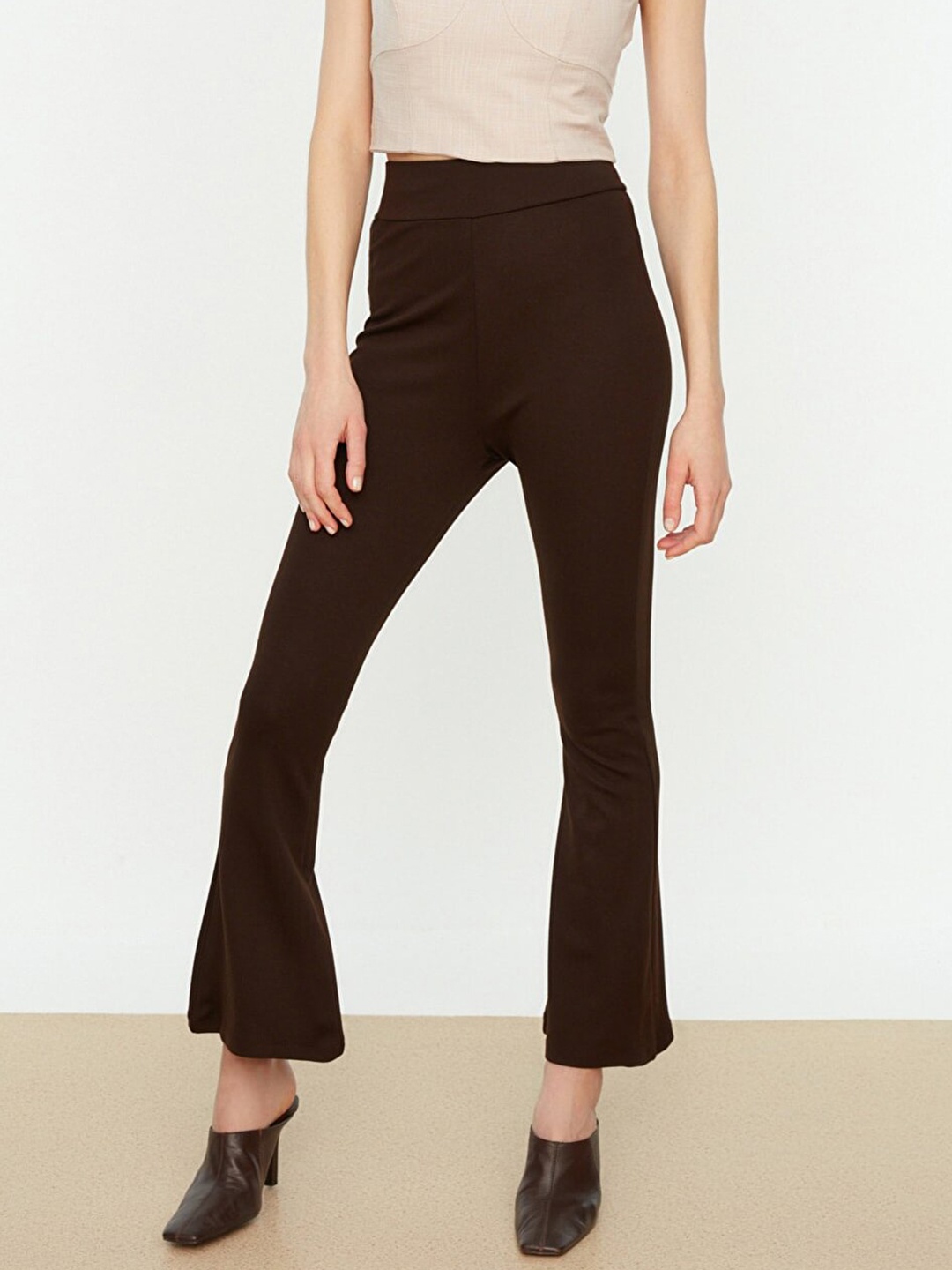 

Trendyol Women Coffee Brown Solid Flared High-Rise Trousers