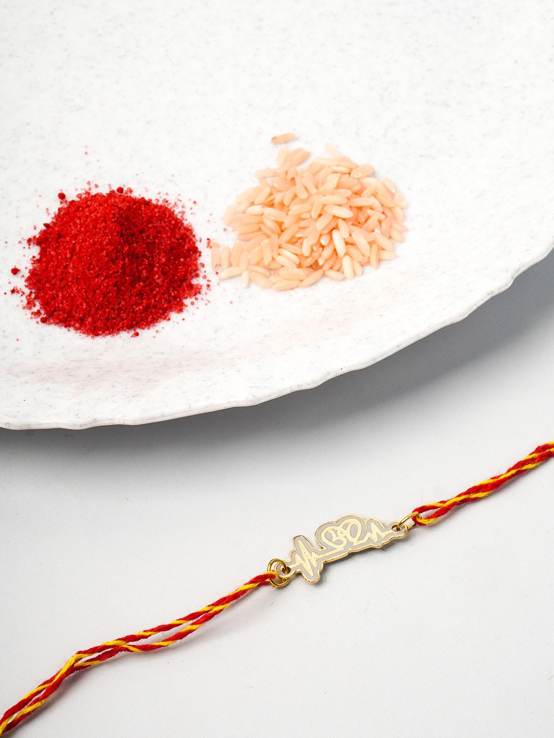 

Ferosh Men Gold-Toned & Red Lifeline Bro Rakhi