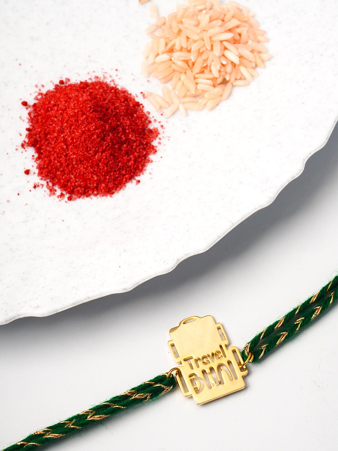 

Ferosh Men Gold Toned & Green Travel Bhai Beaded Rakhi