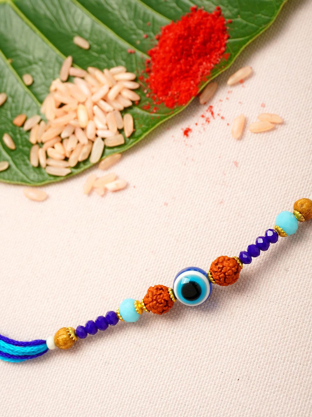 

Ferosh Men Blue & Maroon Rudraksh Beaded Evil-Eye Rakhi