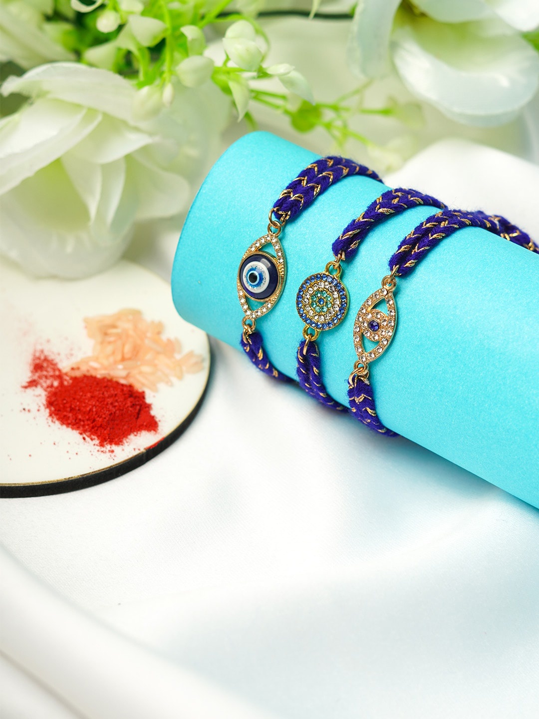 

Ferosh Men Set Of 3 Blue Evil Eye Crystal Thread Rakhi With Roli Chawal