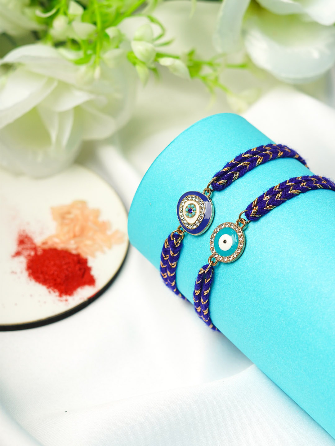 

Ferosh Men Set Of 2 Blue & White Evil Eye Charm Rakhi With Roli Chawal