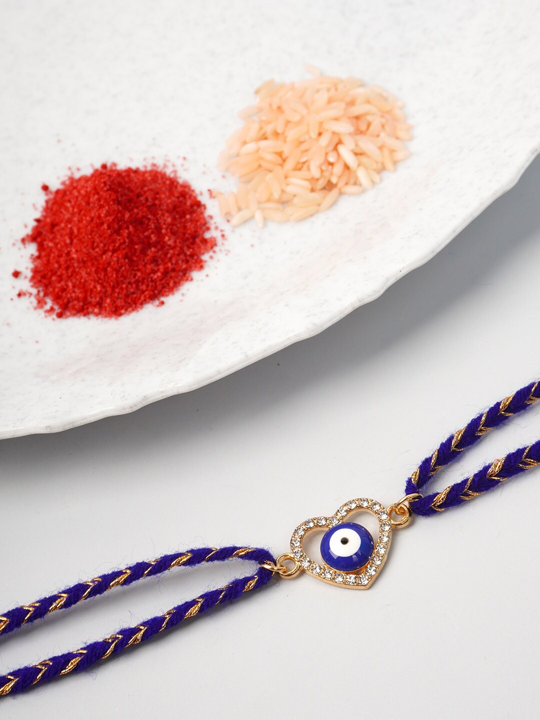 

Ferosh Men Blue Evil Eye Thread Rakhi With Roli Chawal