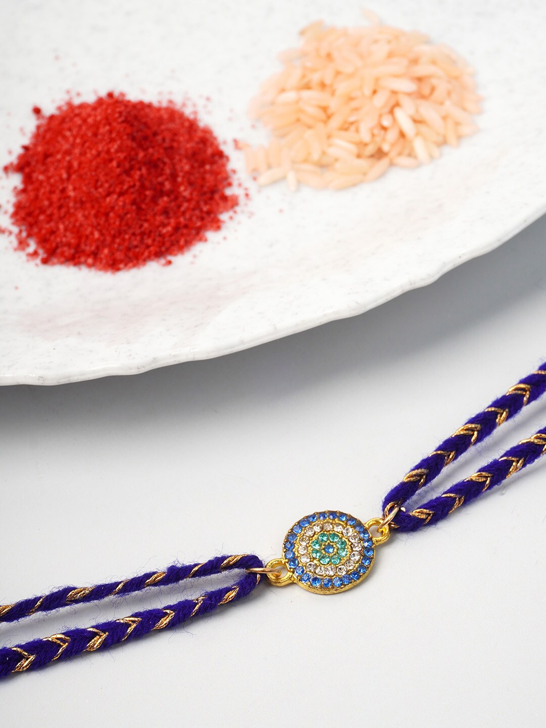 

Ferosh Men Blue Round Crystal Studded Evil Eye Rakhi