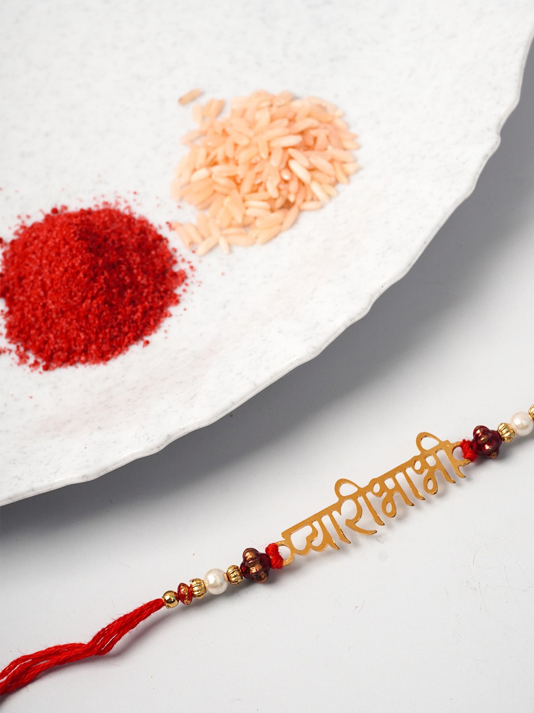 

Ferosh Men Gold-Toned & Red Pyari Bhabhi Rakhi