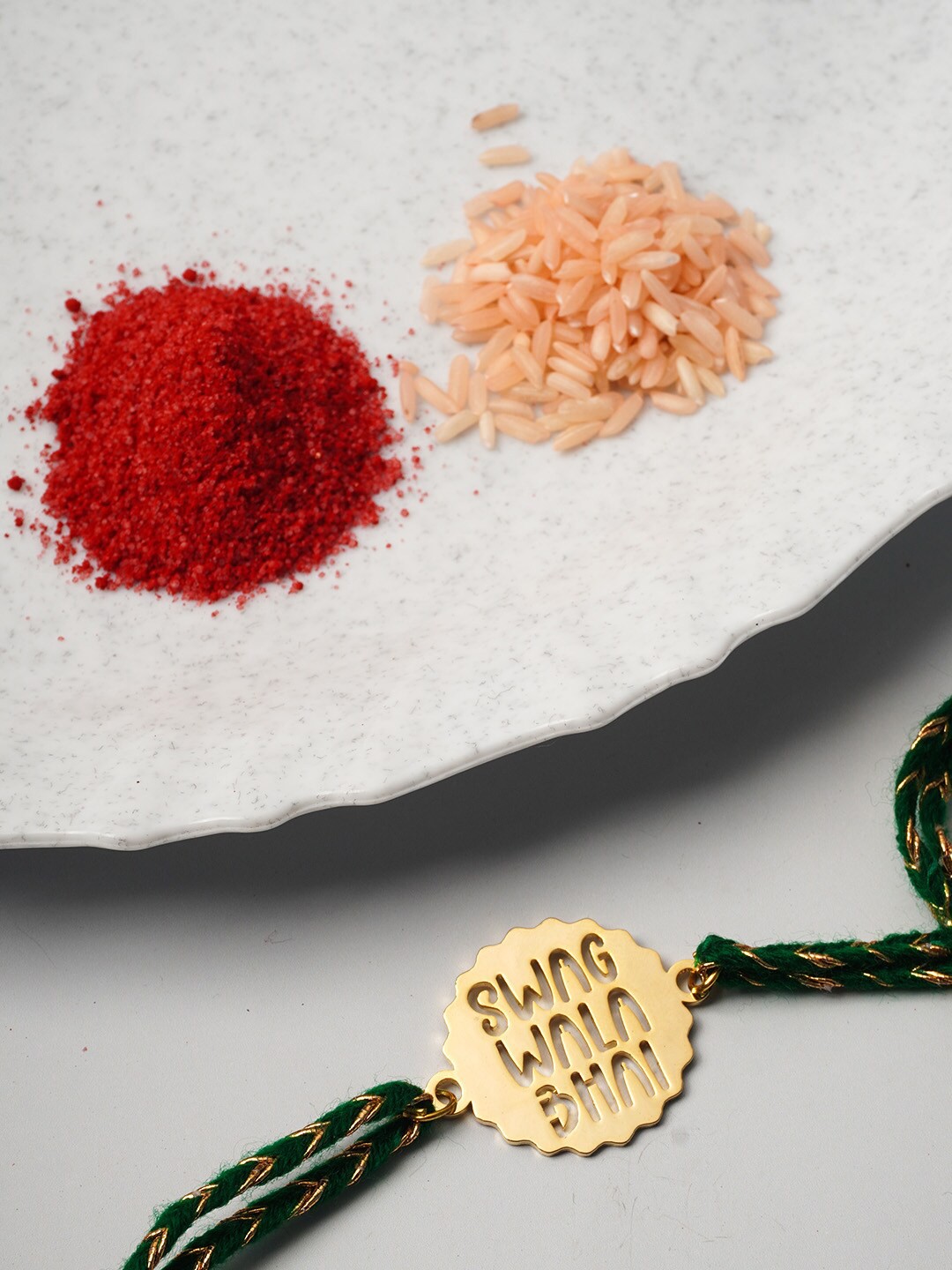 

Ferosh Men Gold & Green Thread Rakhi With Roli Chawal