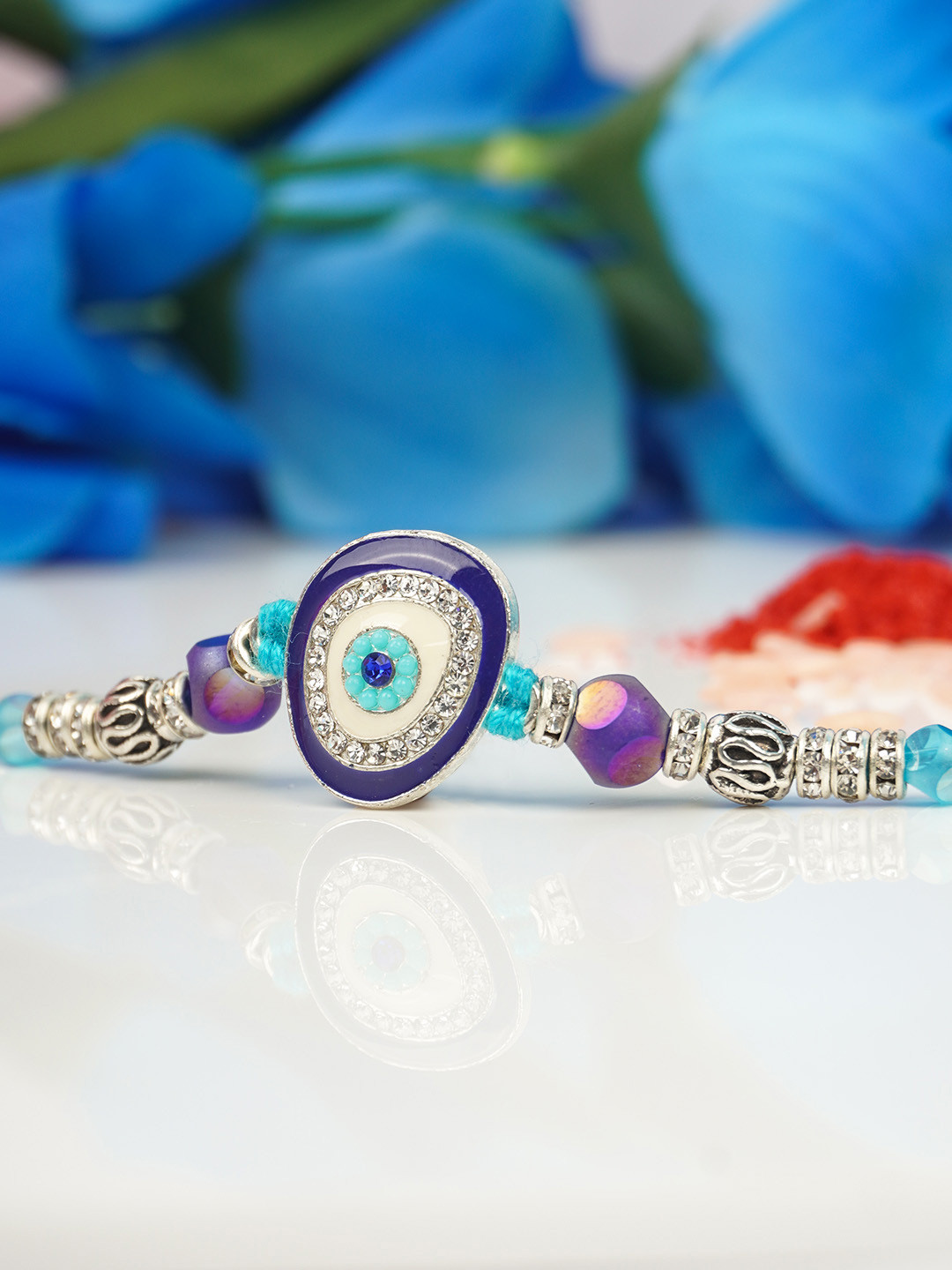 

Ferosh Men Blue & White Evil Eye Rakhi