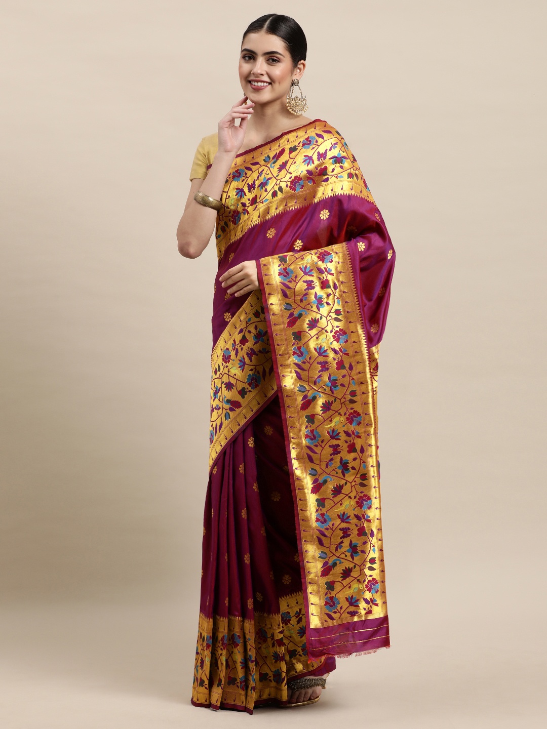 

Royal Rajgharana Saree Purple & Golden Ethnic Motifs Zari Woven Design Paithani Sarees