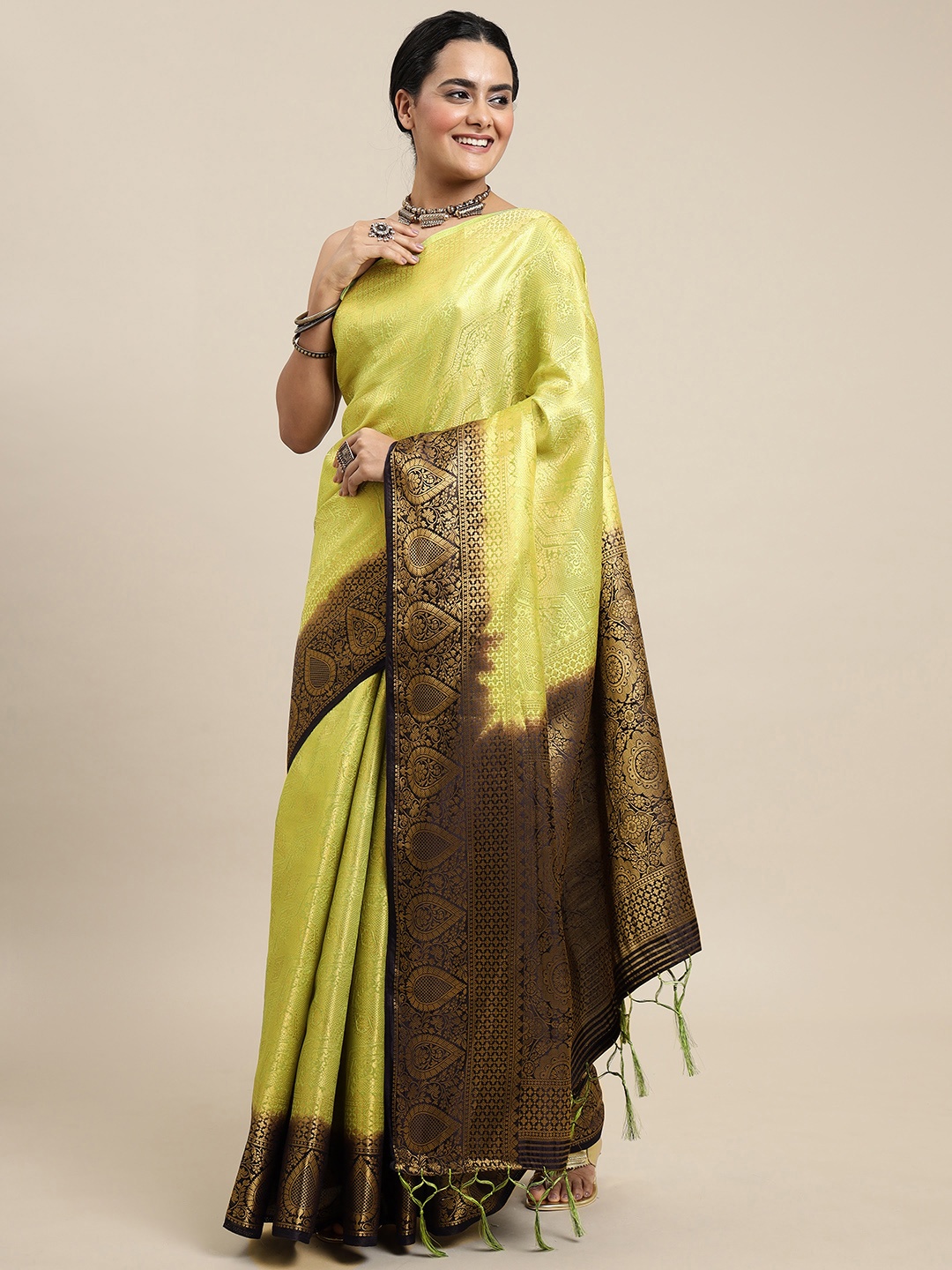 

Royal Rajgharana Saree Green Woven Design Zari Silk Blend Banarasi Saree