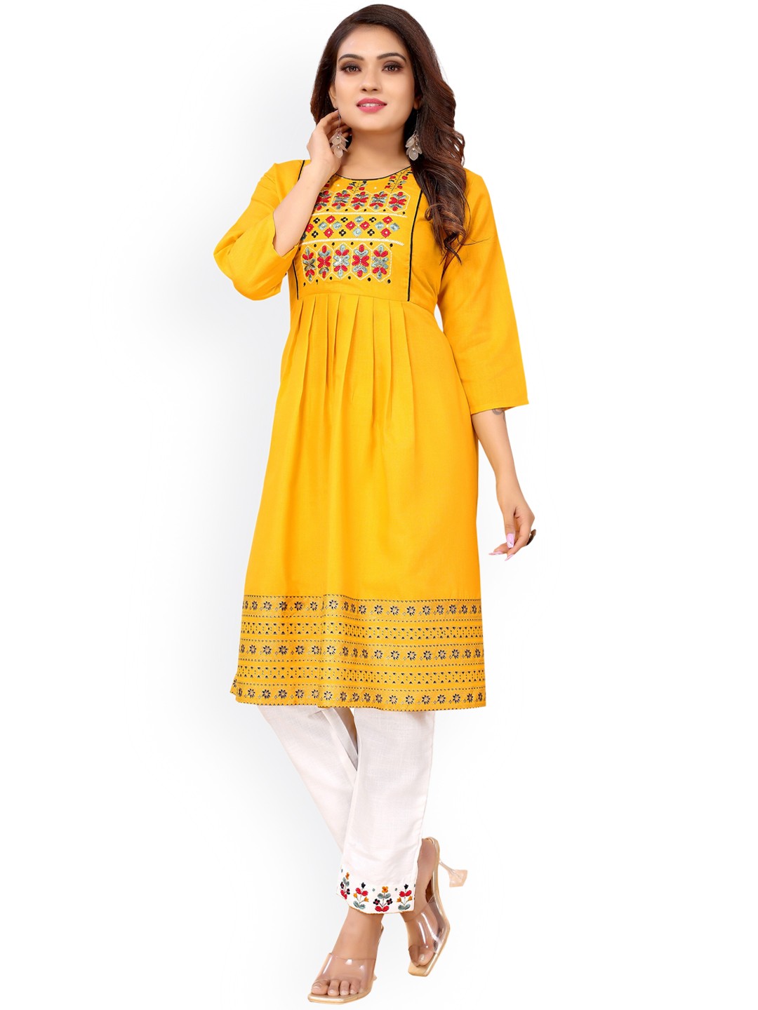 

Nimayaa Women Mustard Yellow Embroidered Thread Work Kurti with Trousers