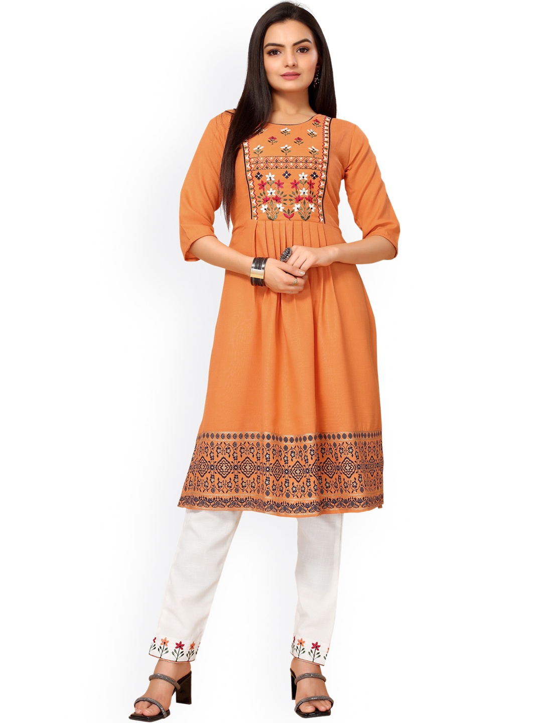 

Nimayaa Women Orange Floral Embroidered Pleated Thread Work Kurta with Trousers