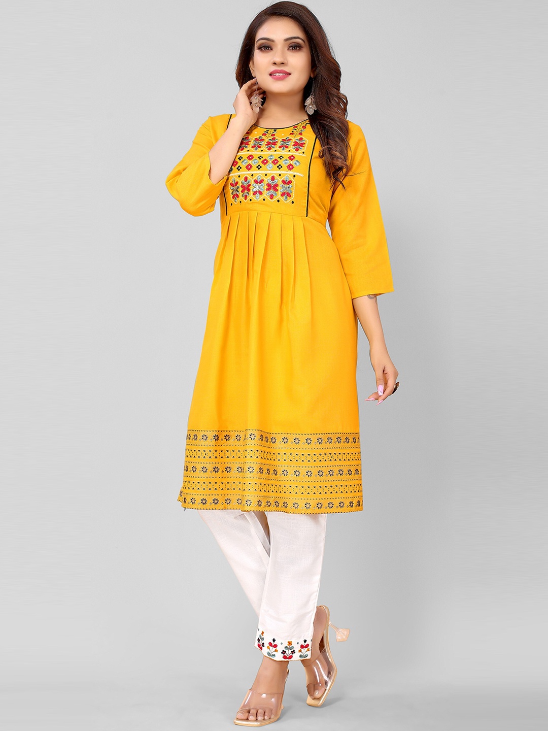 

KALINI Women Mustard Yellow Embroidered Thread Work Kurti with Trousers