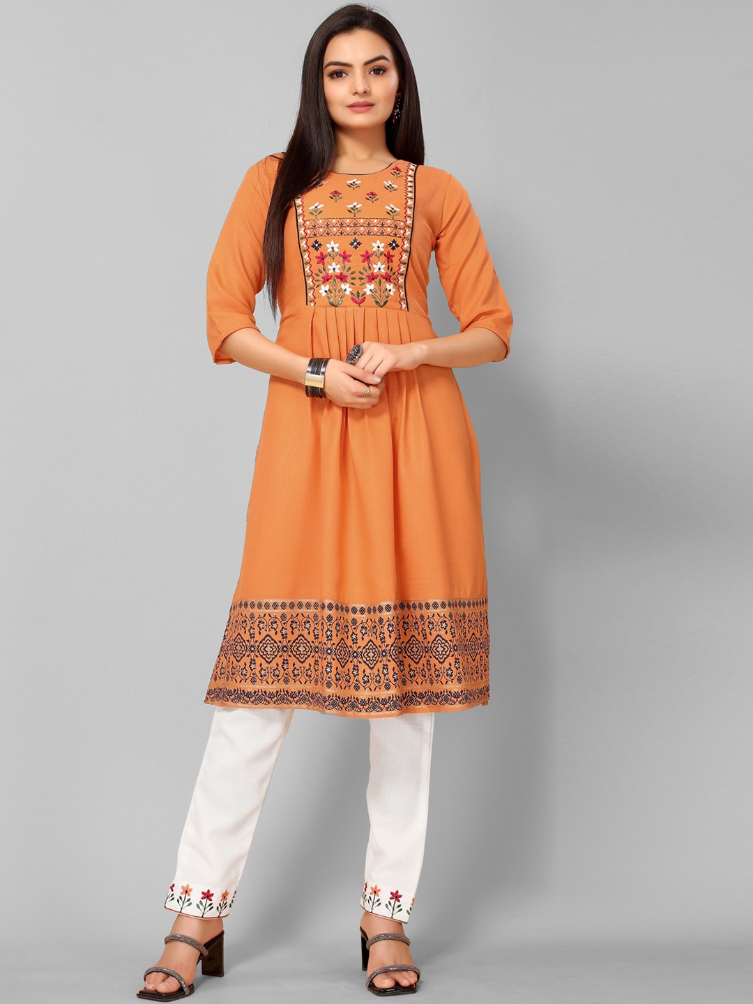 

KALINI Women Orange Floral Embroidered Pleated Thread Work Kurti with Trousers