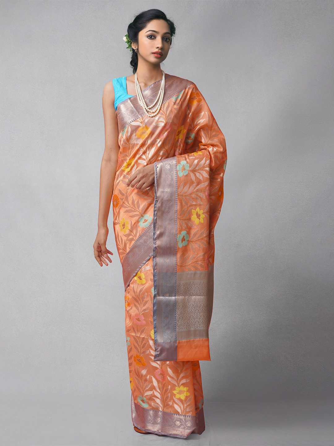 

Unnati Silks Orange & Silver-Toned Woven Design Zari Silk Cotton Banarasi Saree