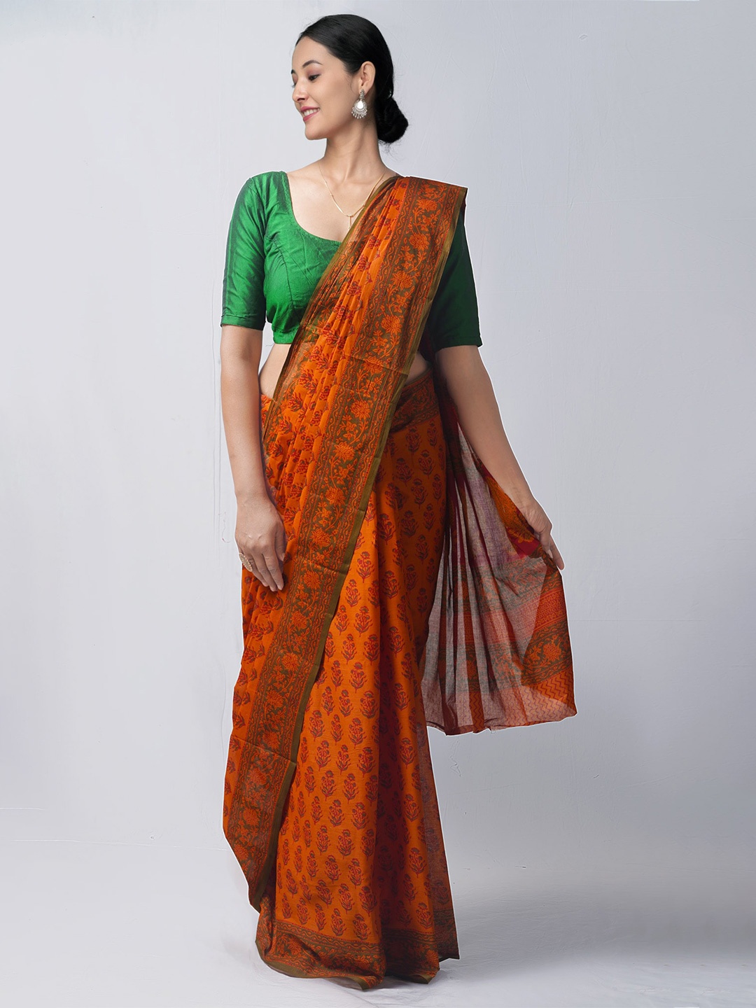 

Unnati Silks Orange & Green Ethnic Motifs Pure Cotton Block Print Saree