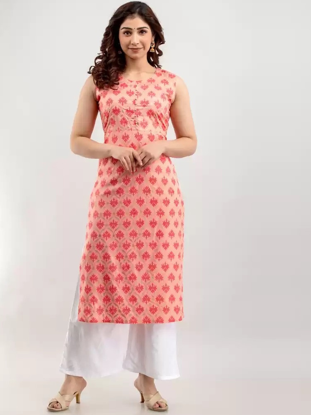 

Meeranshi Women Peach-Coloured High Slit Beads and Stones Kurti with Trousers