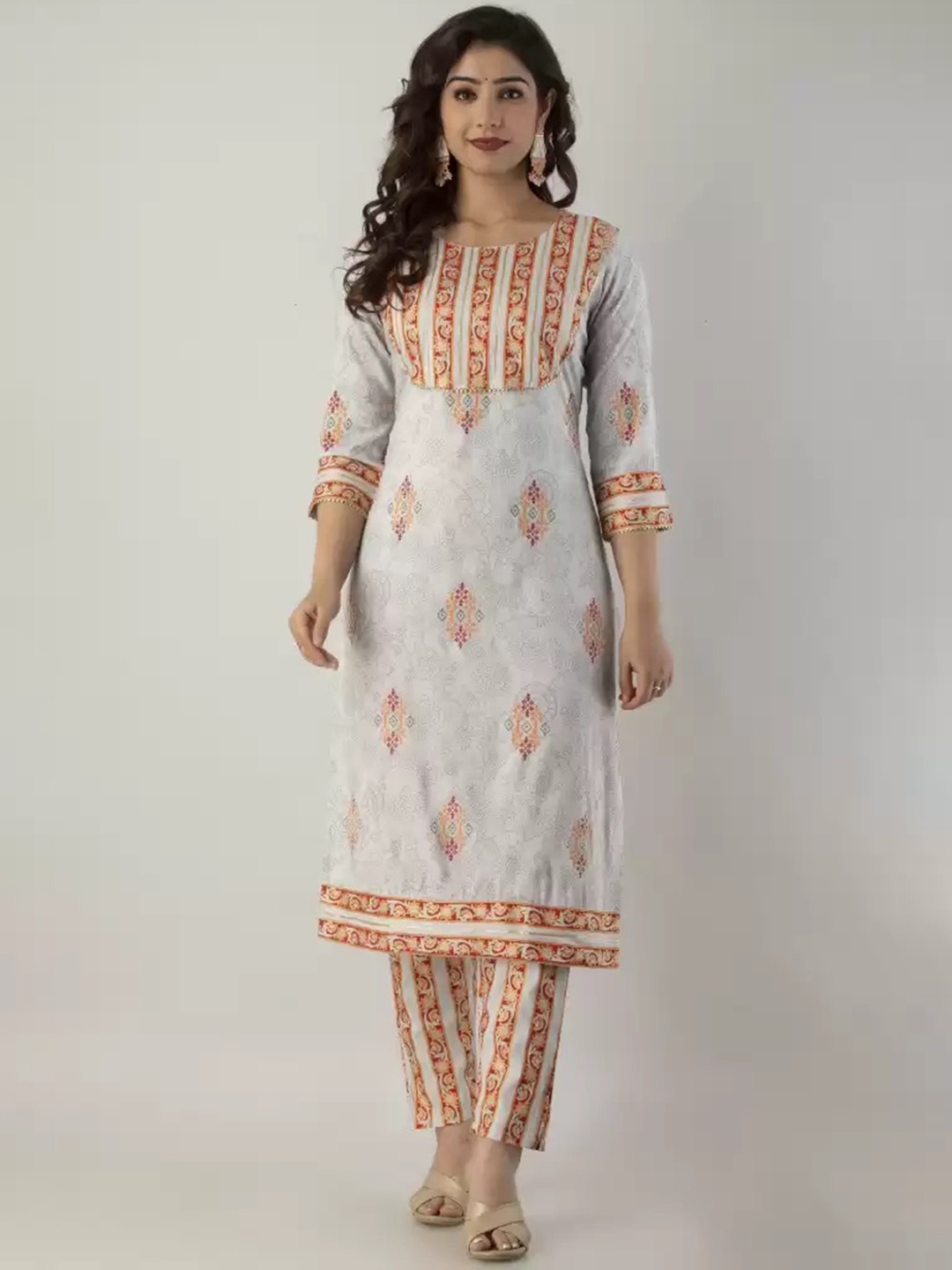 

Meeranshi Women Beige Ethnic Motifs Embroidered Regular Gotta Patti Kurti with Trousers & With Dupatta