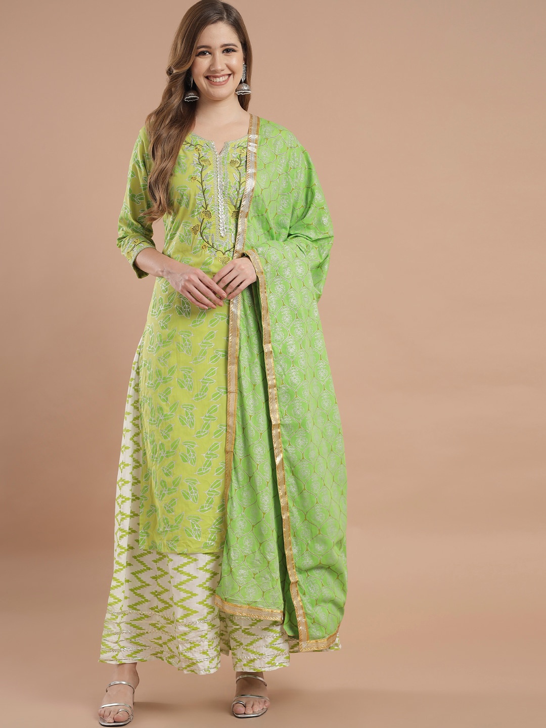 

Meeranshi Women Fluorescent Green Ethnic Motifs Embroidered Panelled Pure Cotton Kurti with Skirt & With