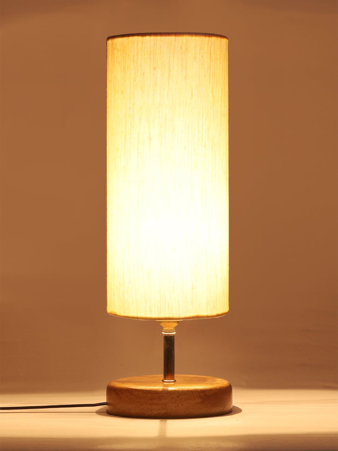 

Devansh Off White & Brown Wood Table lamp With Cotton Shade