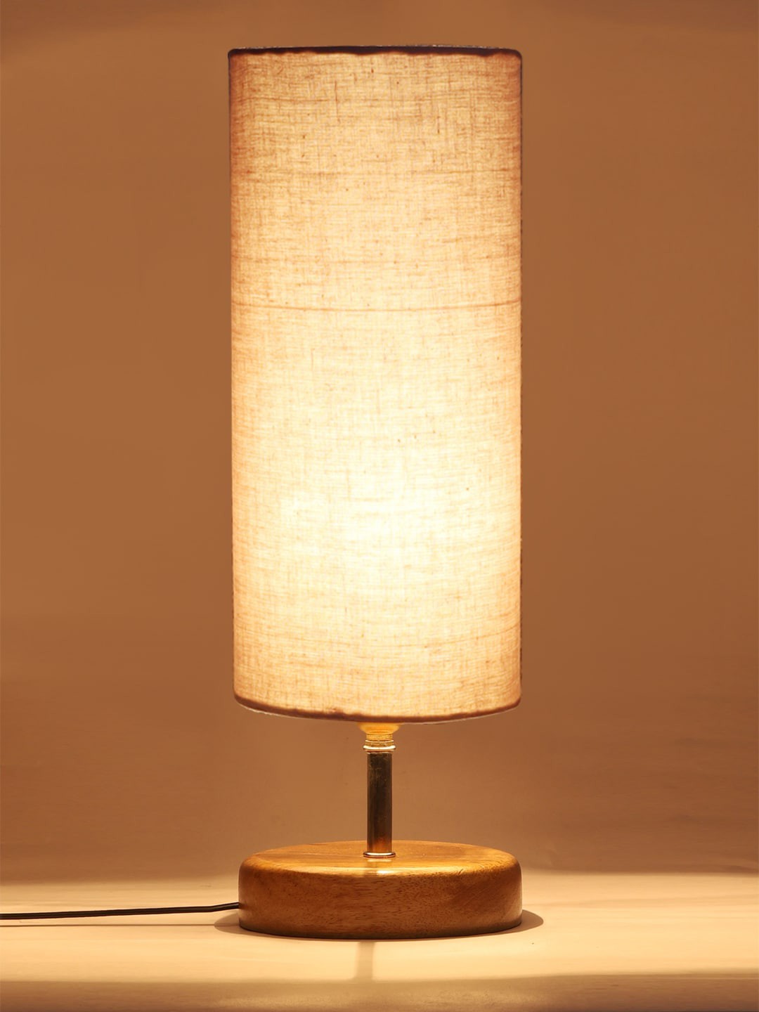 

Devansh Grey & Beige Colored Solid Wood Table lamp with cotton Shade
