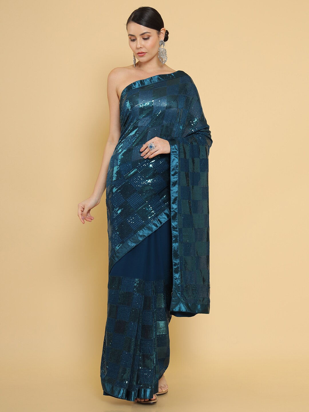 

Soch Teal Zari Pure Georgette Saree
