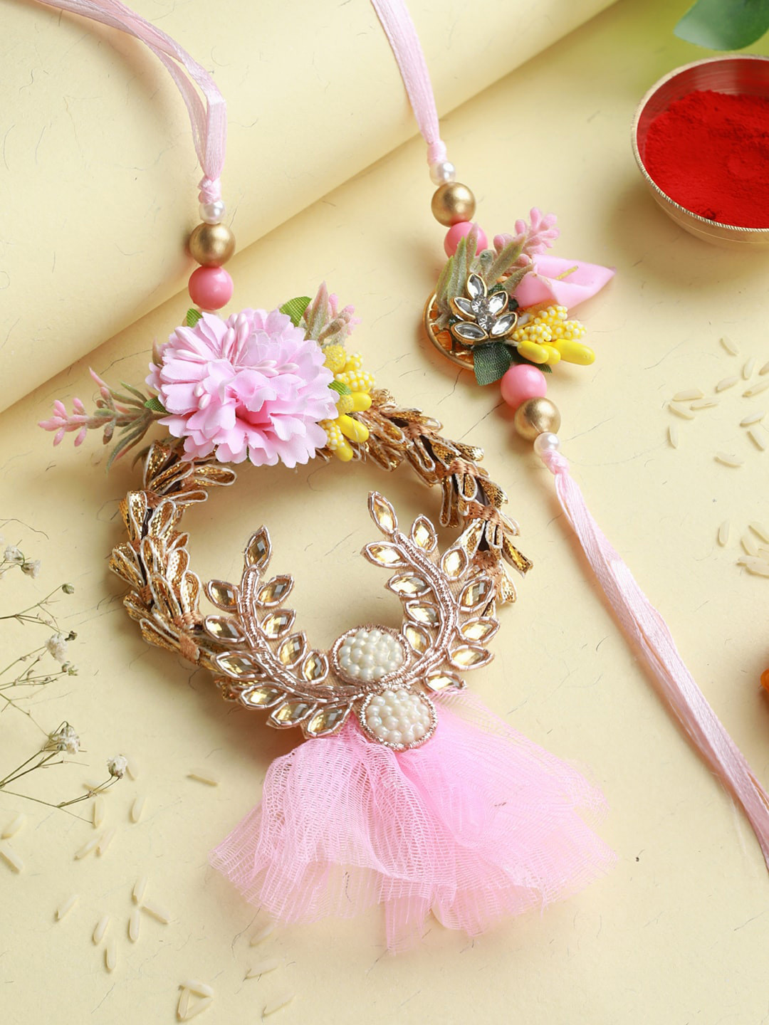 

Priyaasi Pink Floral Beaded Lumba & Rakhi with Roli Chawal & Card