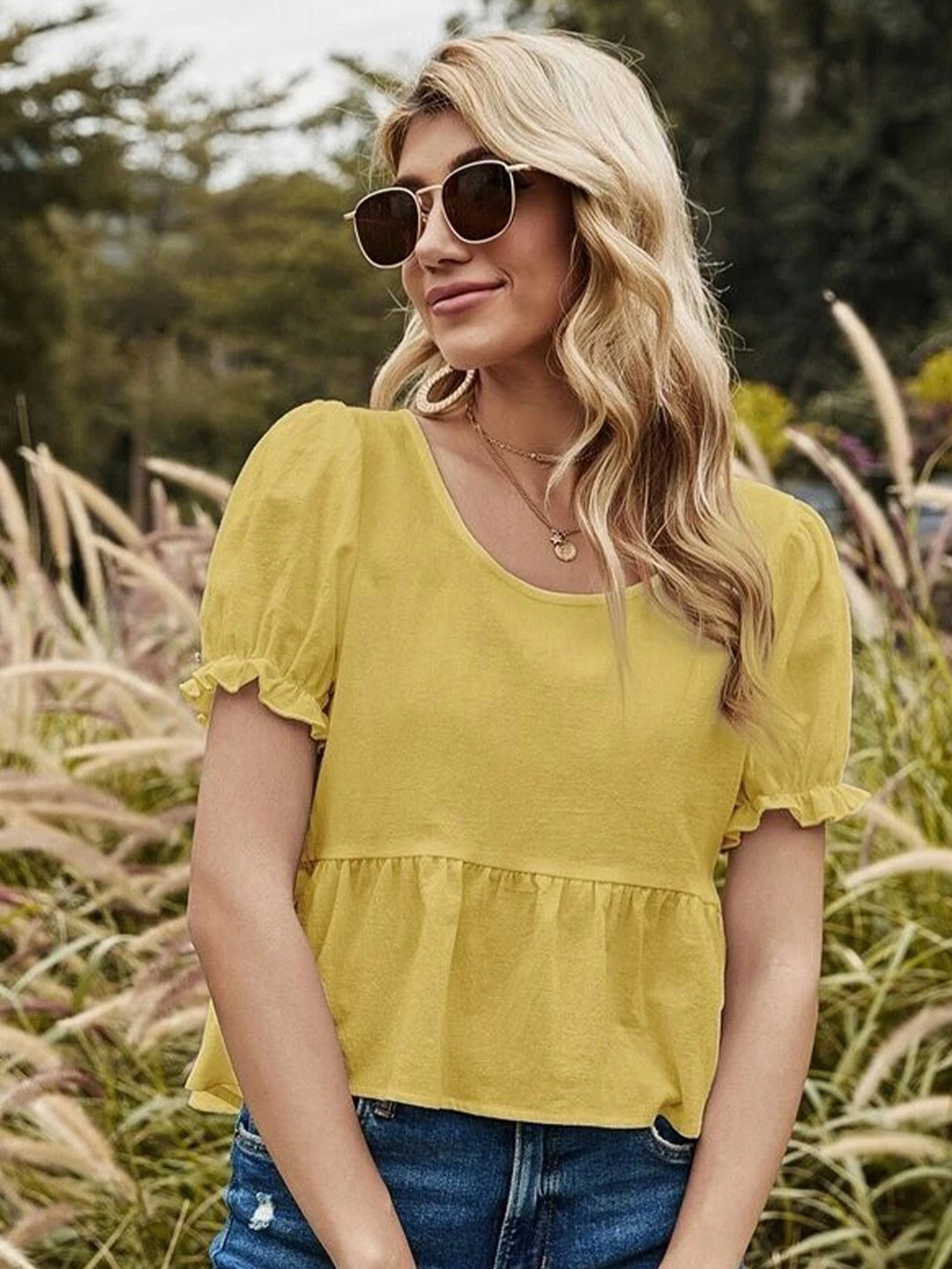 

La Aimee Yellow Peplum Top