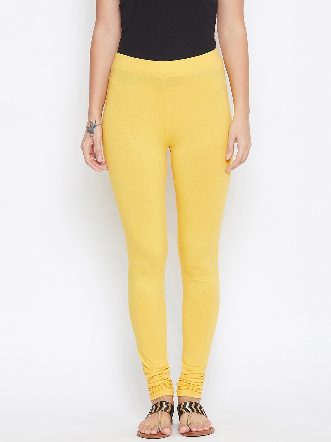 

ALIZA Women Yellow Solid Ankle-Length Leggings