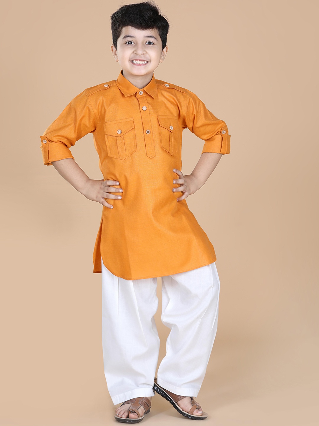 

Aj DEZInES Boys Orange Angrakha Thread Work Pure Cotton Kurta with Salwar