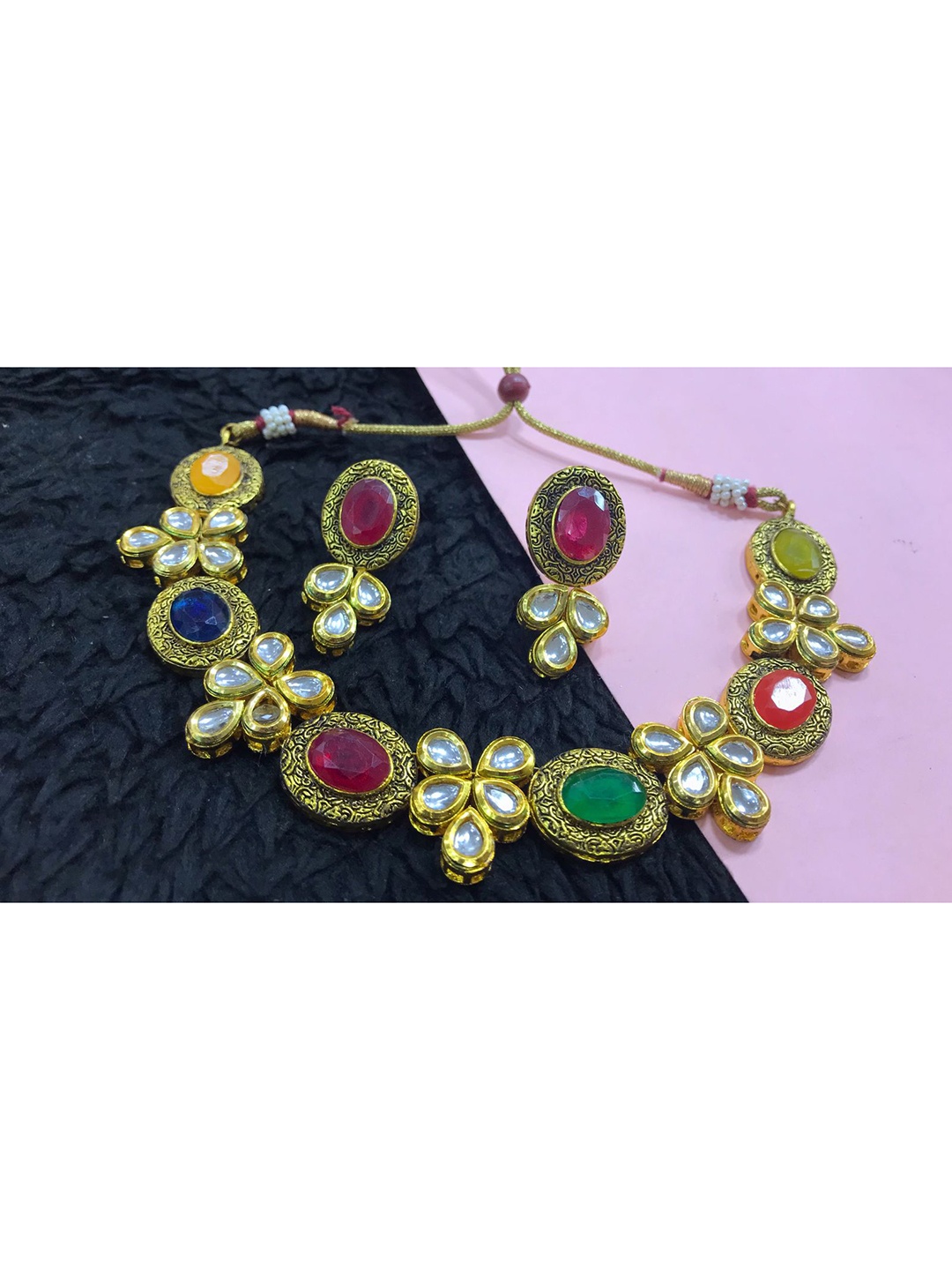 

SURYAM DESIGNER JEWELLERY Gold-Plated Kundan Studded Jewellery Set