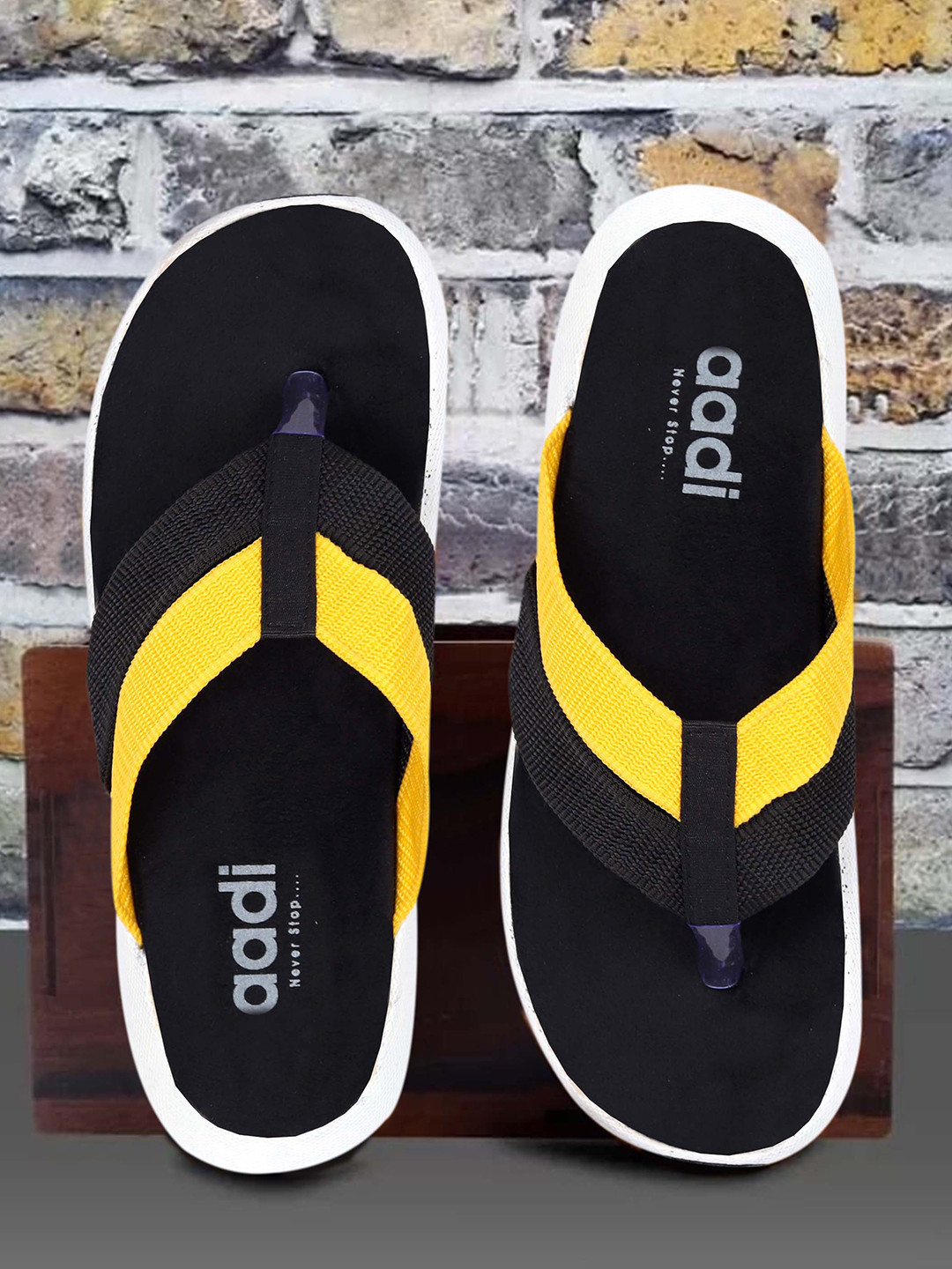 

aadi Men Black & Yellow Slip-On