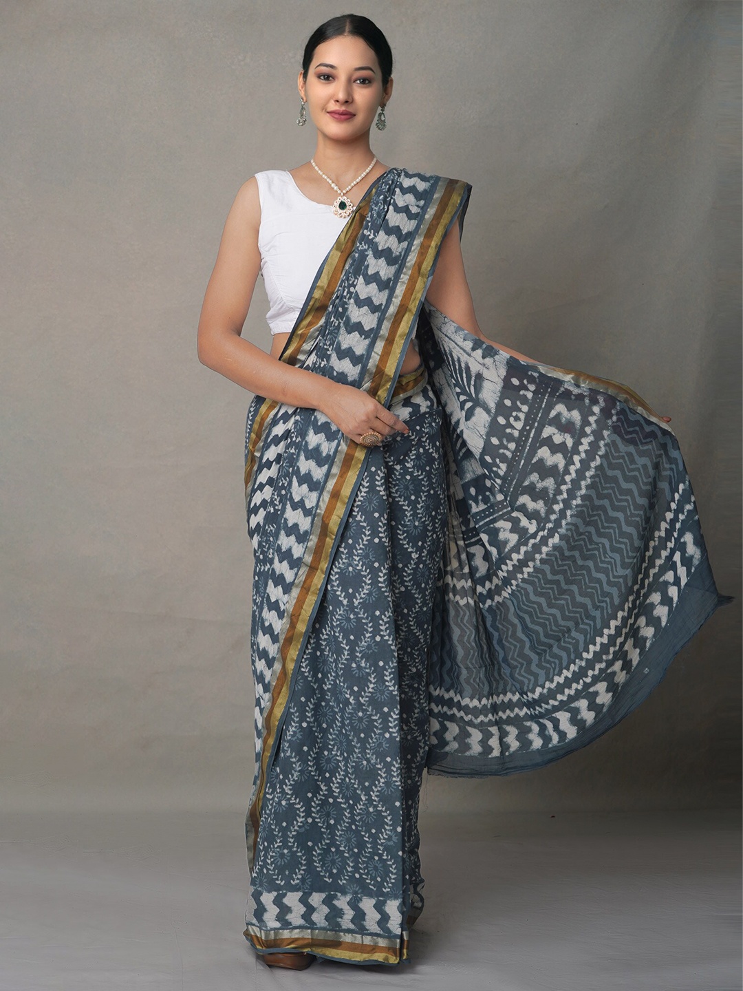 

Unnati Silks Teal & Gold-Toned Ethnic Motifs Pure Cotton Block Print Saree