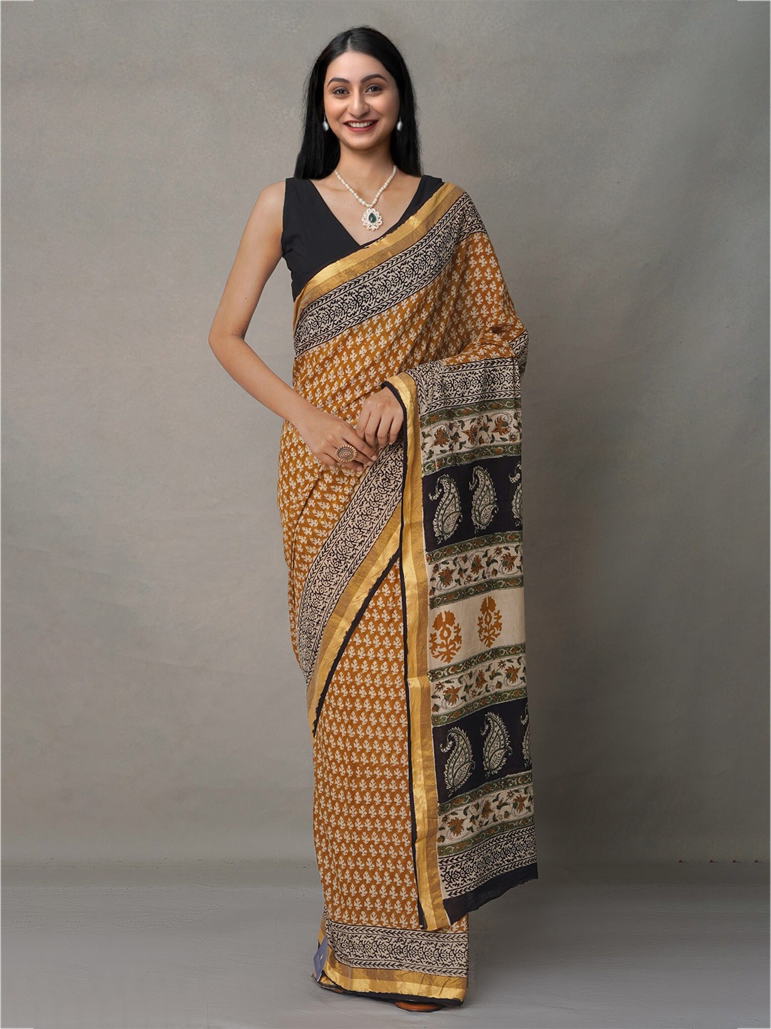 

Unnati Silks Orange Ethnic Motifs Pure Cotton Block Print Saree