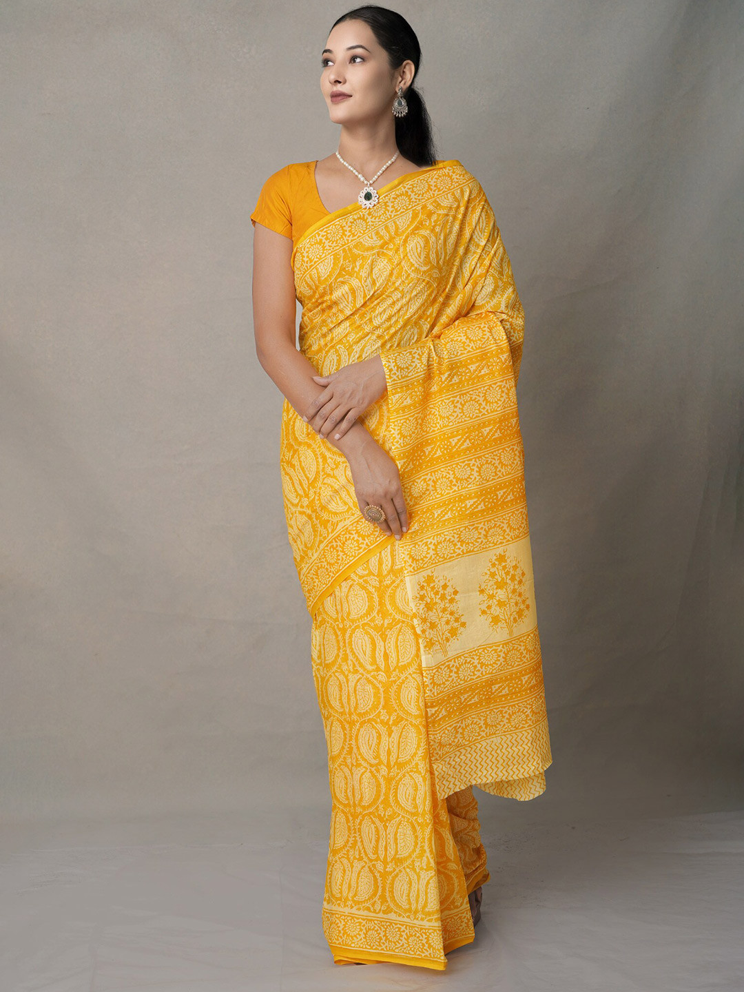 

Unnati Silks Yellow & Pink Ethnic Motifs Pure Cotton Block Print Saree