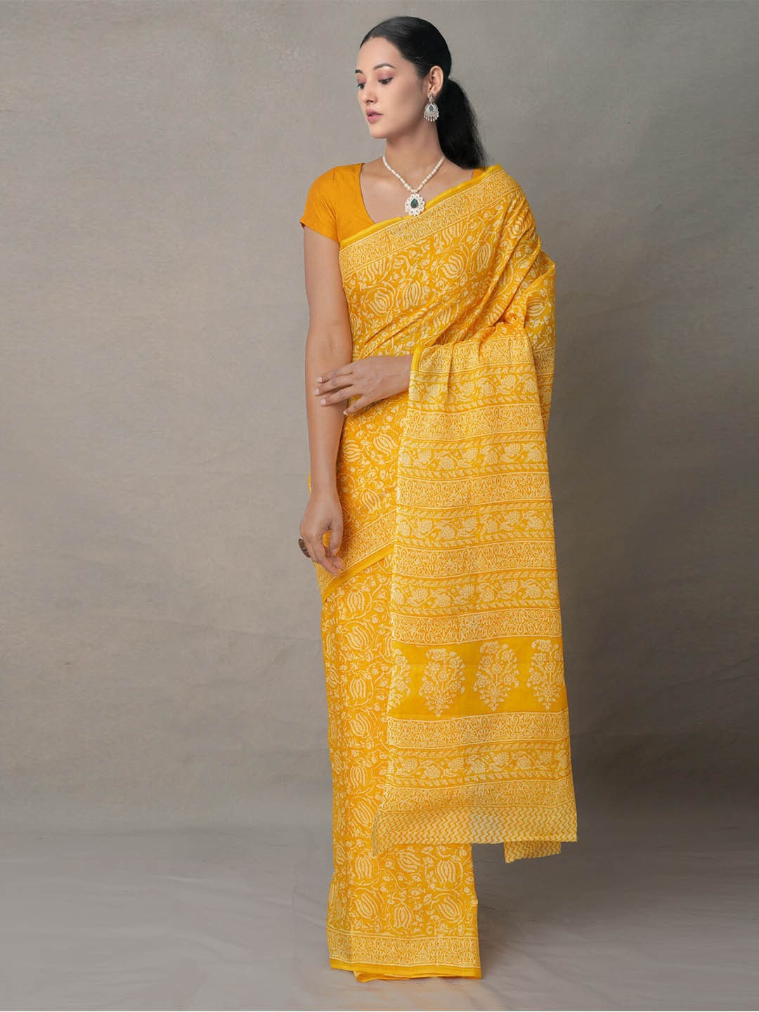 

Unnati Silks Yellow Ethnic Motifs Pure Cotton Block Print Saree