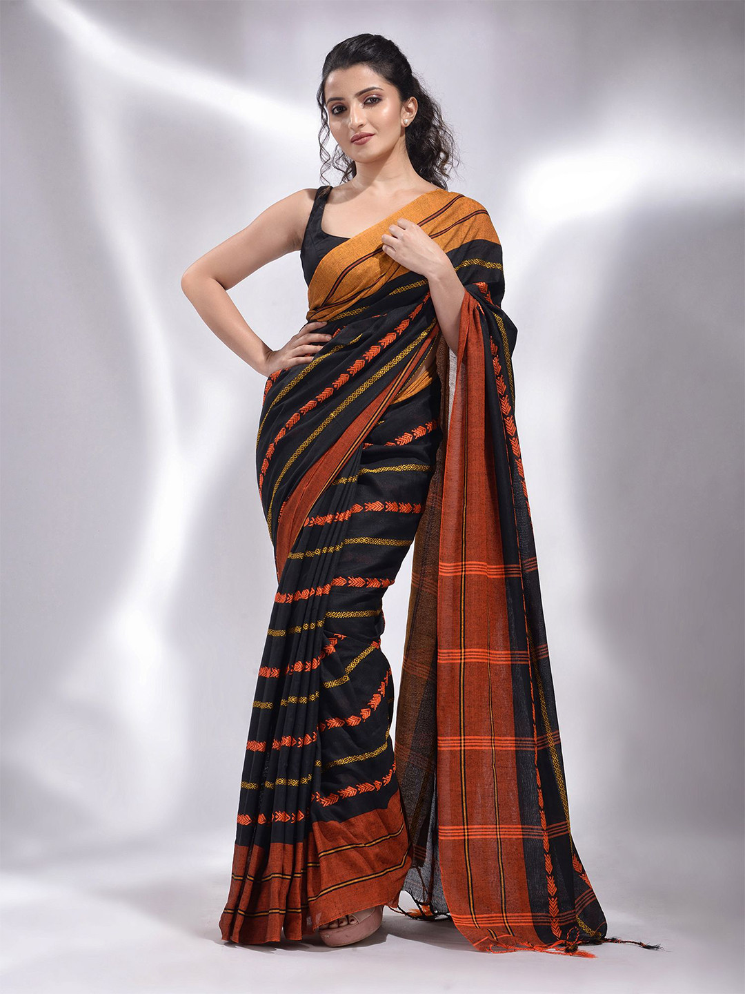 

Charukriti Black & Orange Woven Design Pure Cotton Saree
