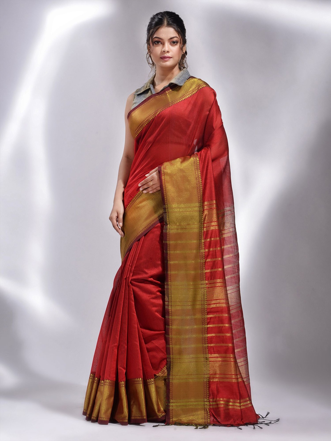 

Charukriti Red & Gold-Toned Woven Design Zari Saree